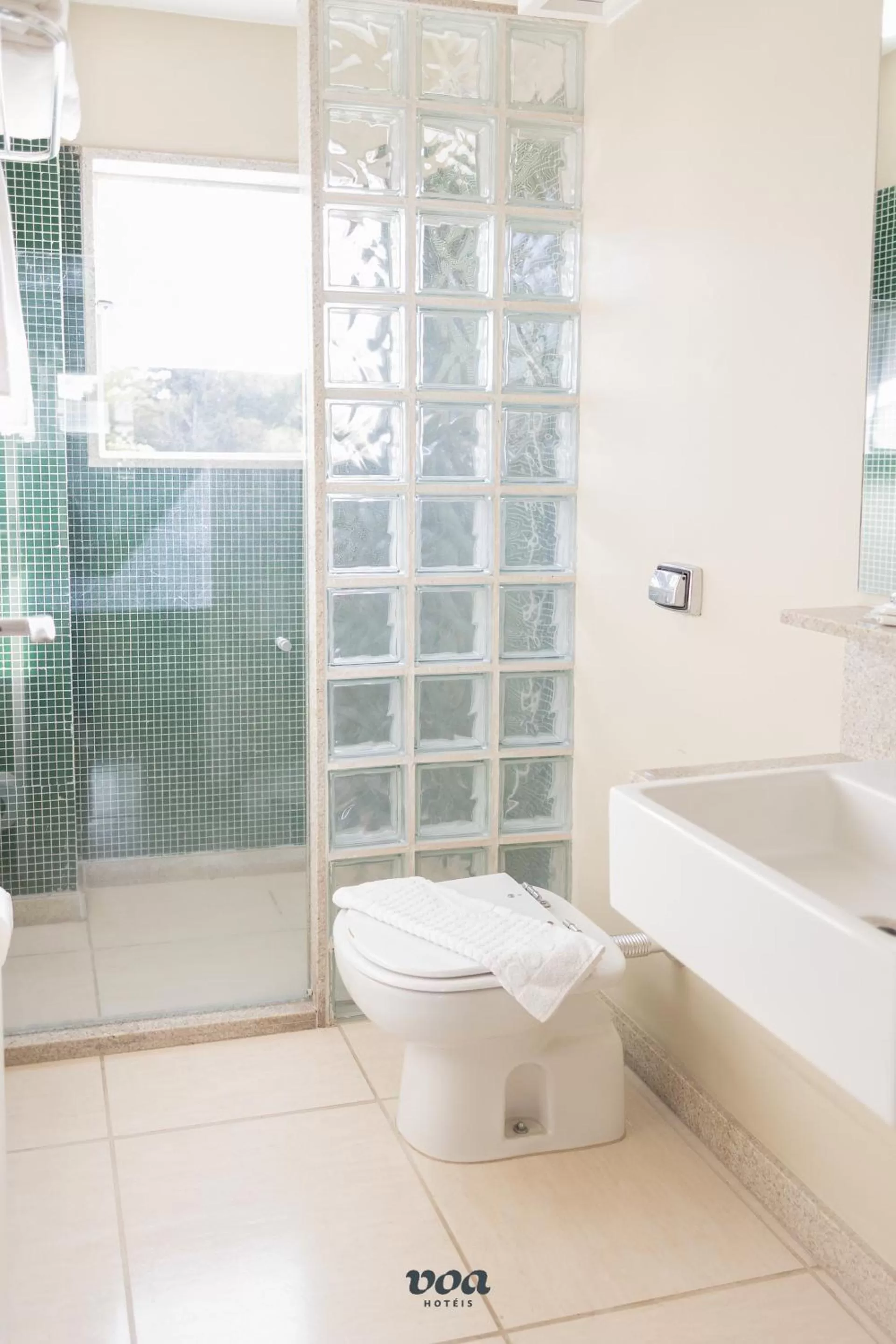 Toilet in VOA Plazza Hotel