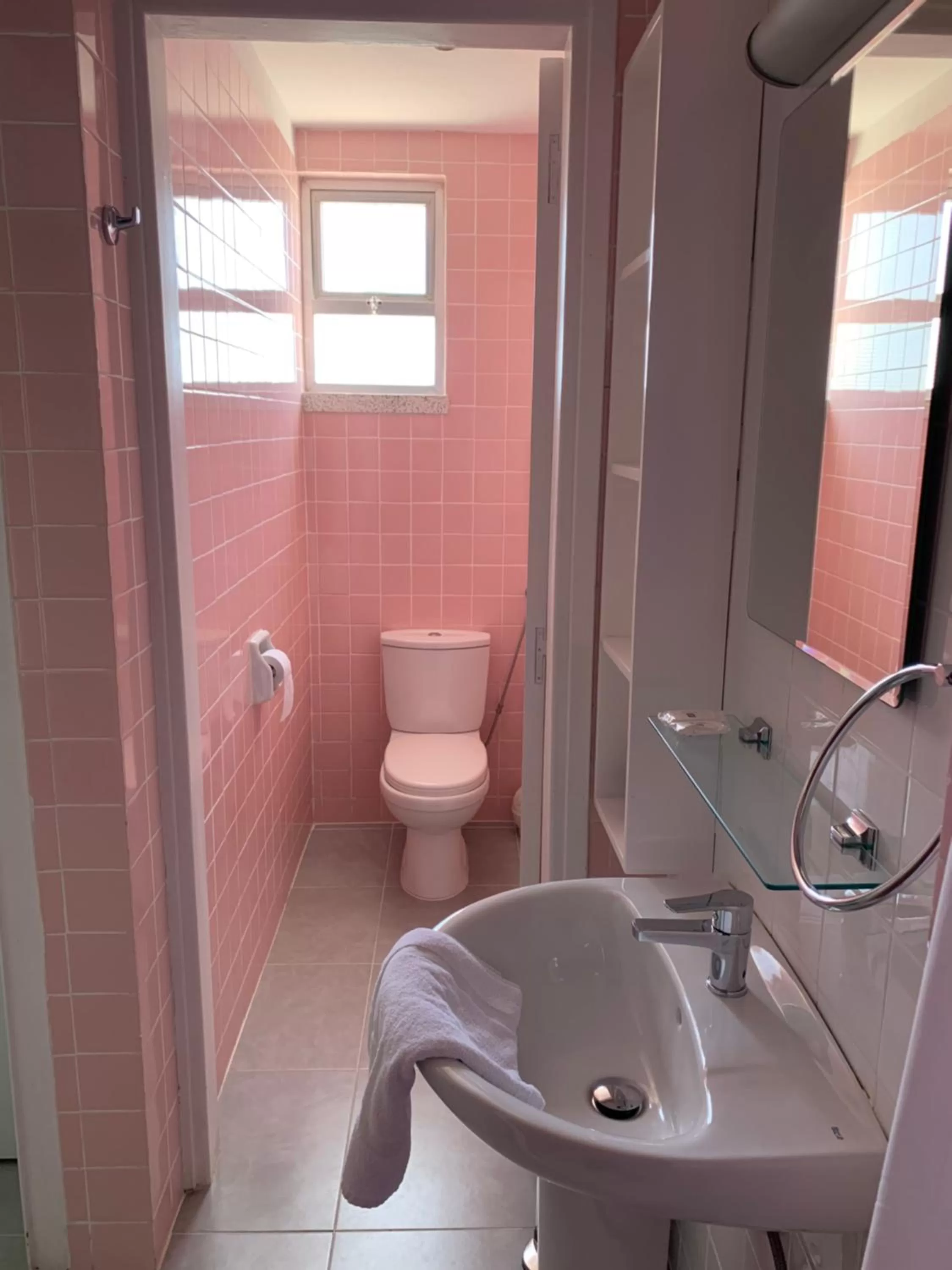 Toilet in Axiothea Hotel