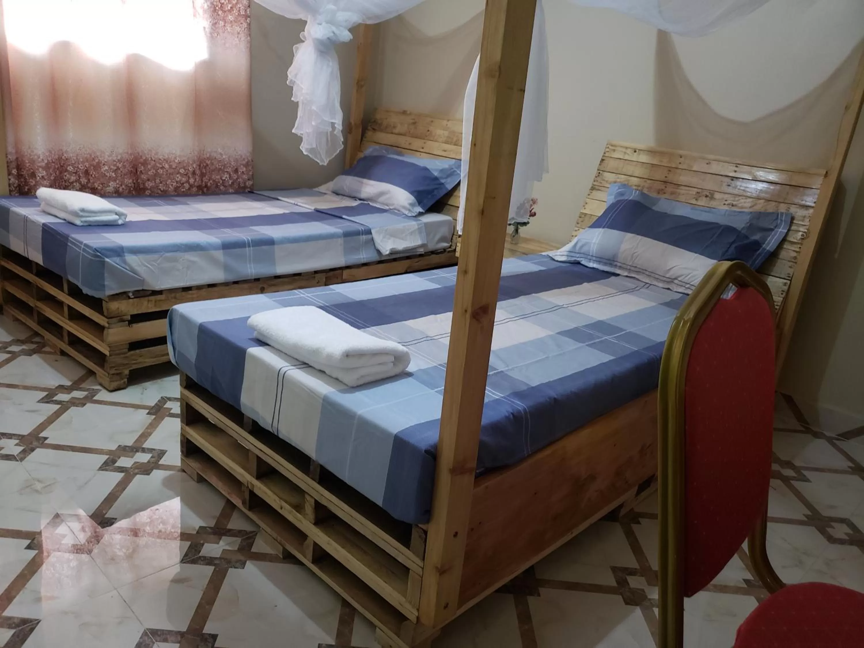 Bed in L&J Modern Backpackers Kinondoni