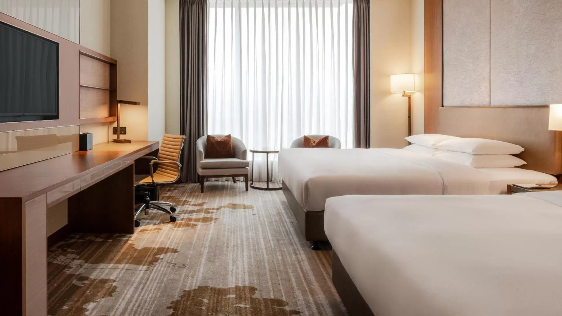 Bed in Courtyard by Marriott Taipei