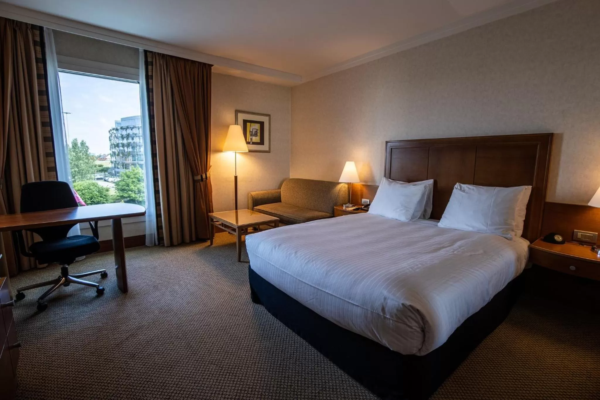 Photo of the whole room, Bed in Crowne Plaza Brussels Airport by IHG