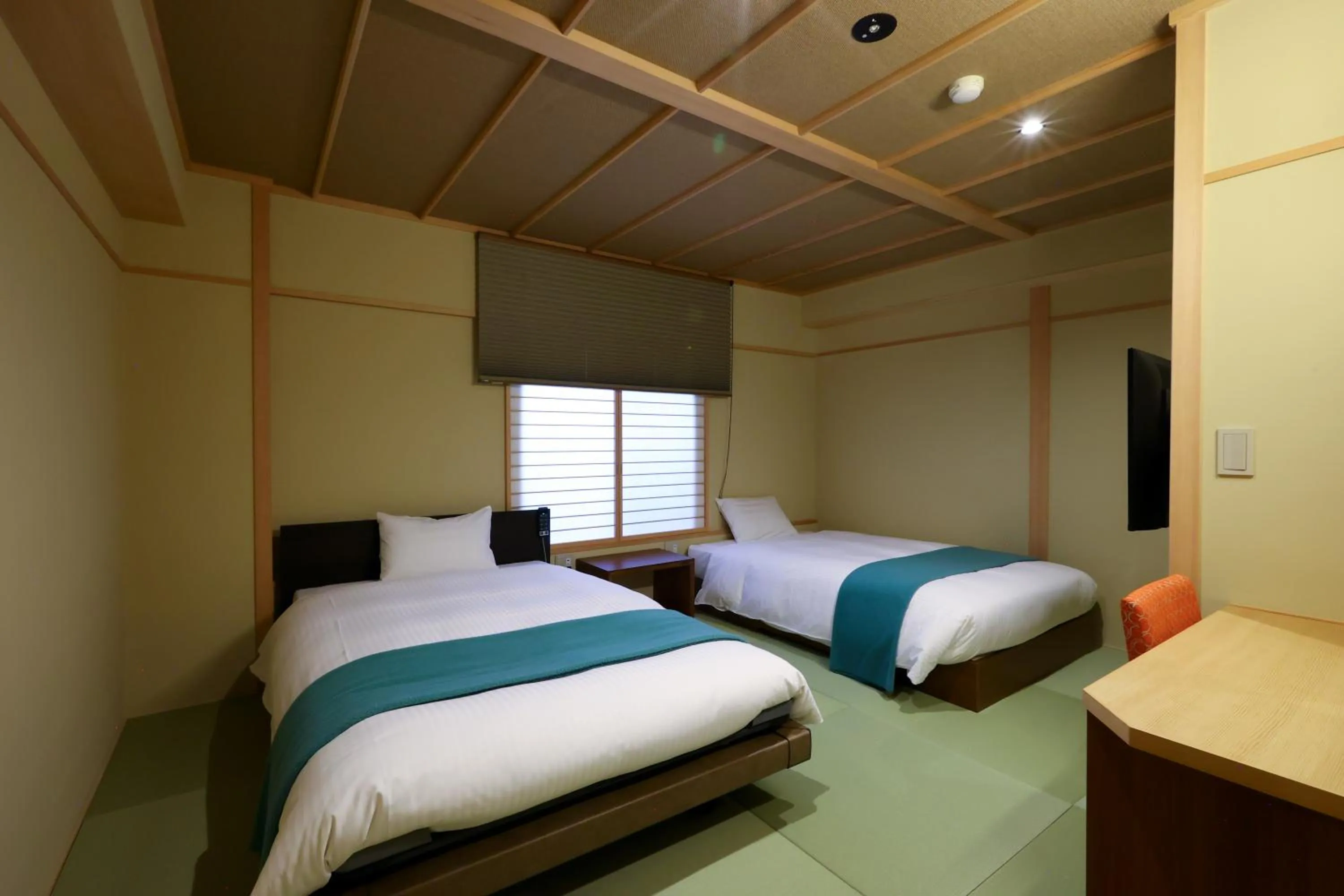 Bed in Hotel Tamanoyu