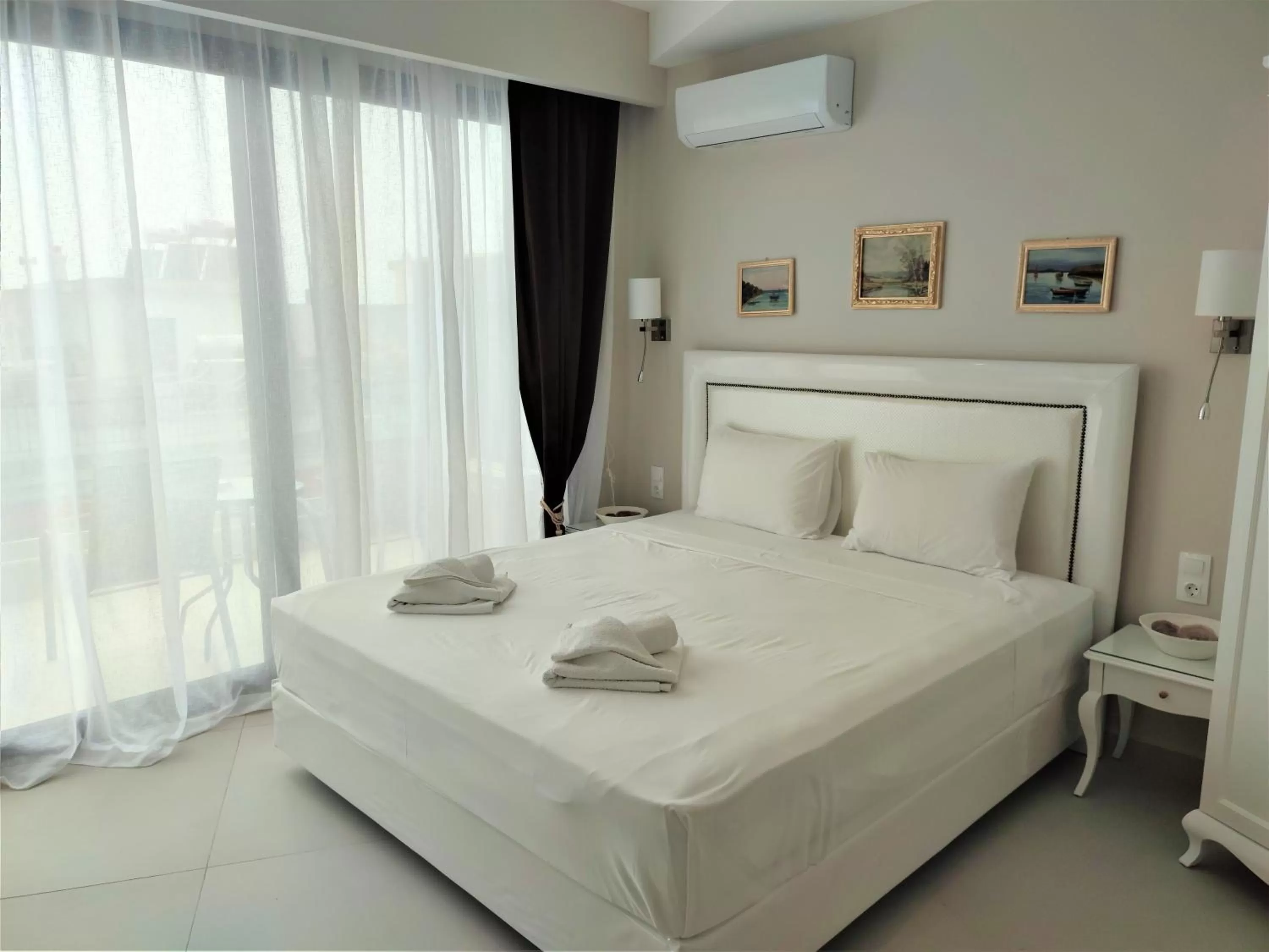 Bed in Light Blue Hotel