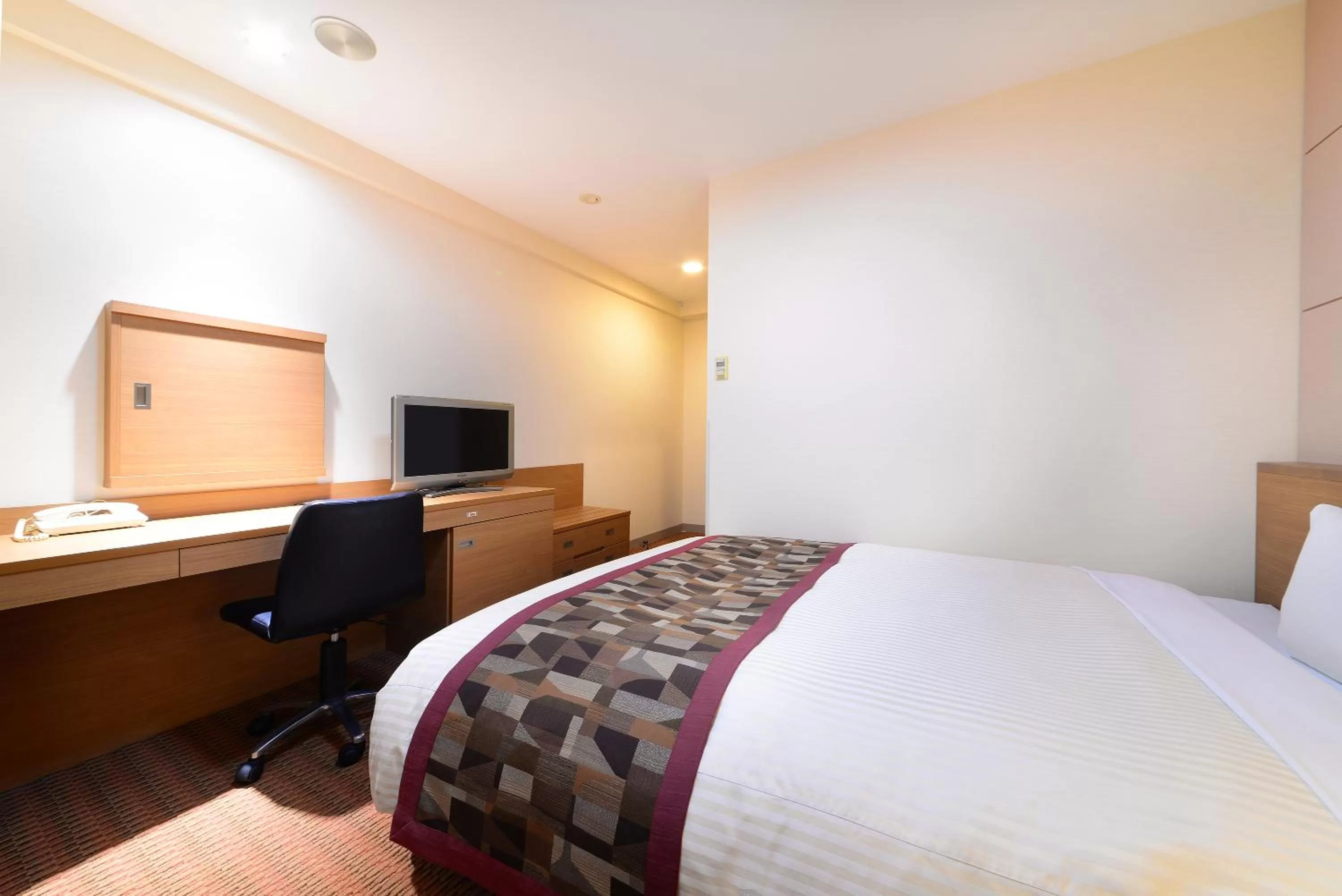 Bed in Vessel Inn Fukuyama Station