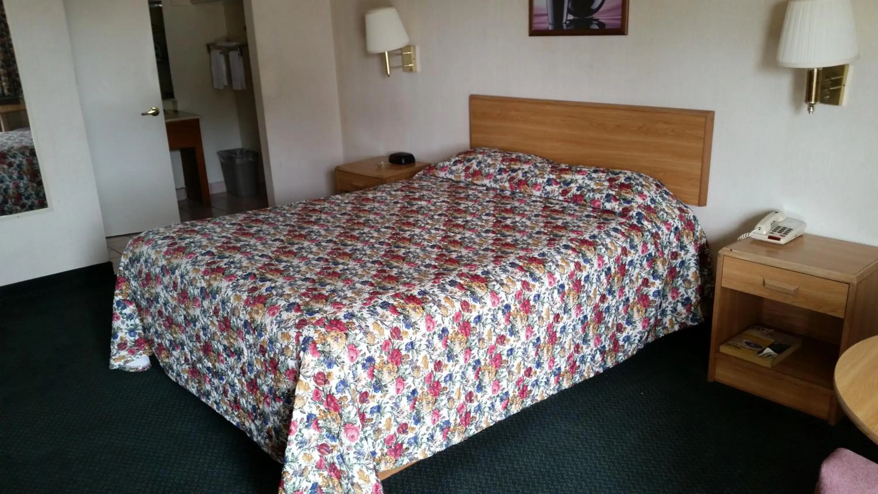 Bed in Economy Inn Motel