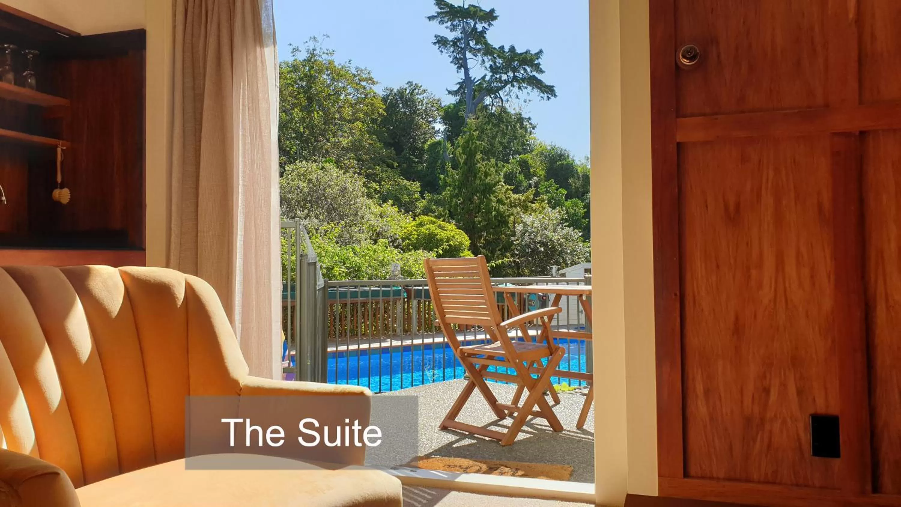 Living room, Pool View in Bluff Hill Bed & Breakfast