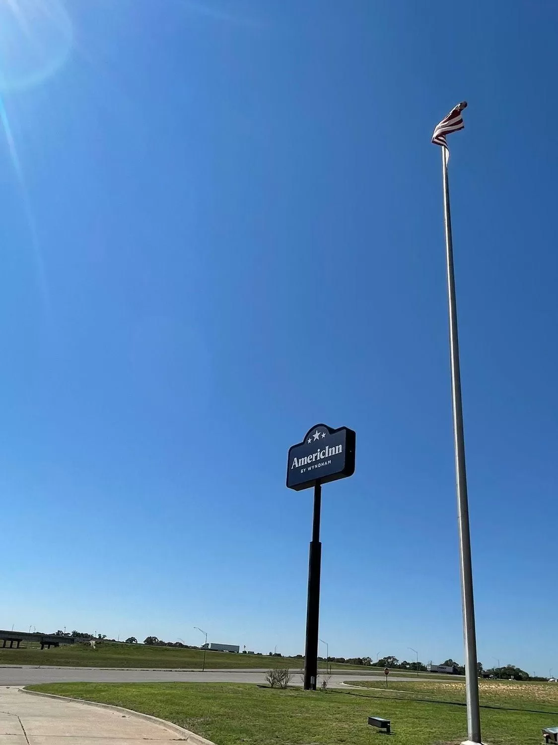 Property logo or sign in AmericInn by Wyndham Sayre