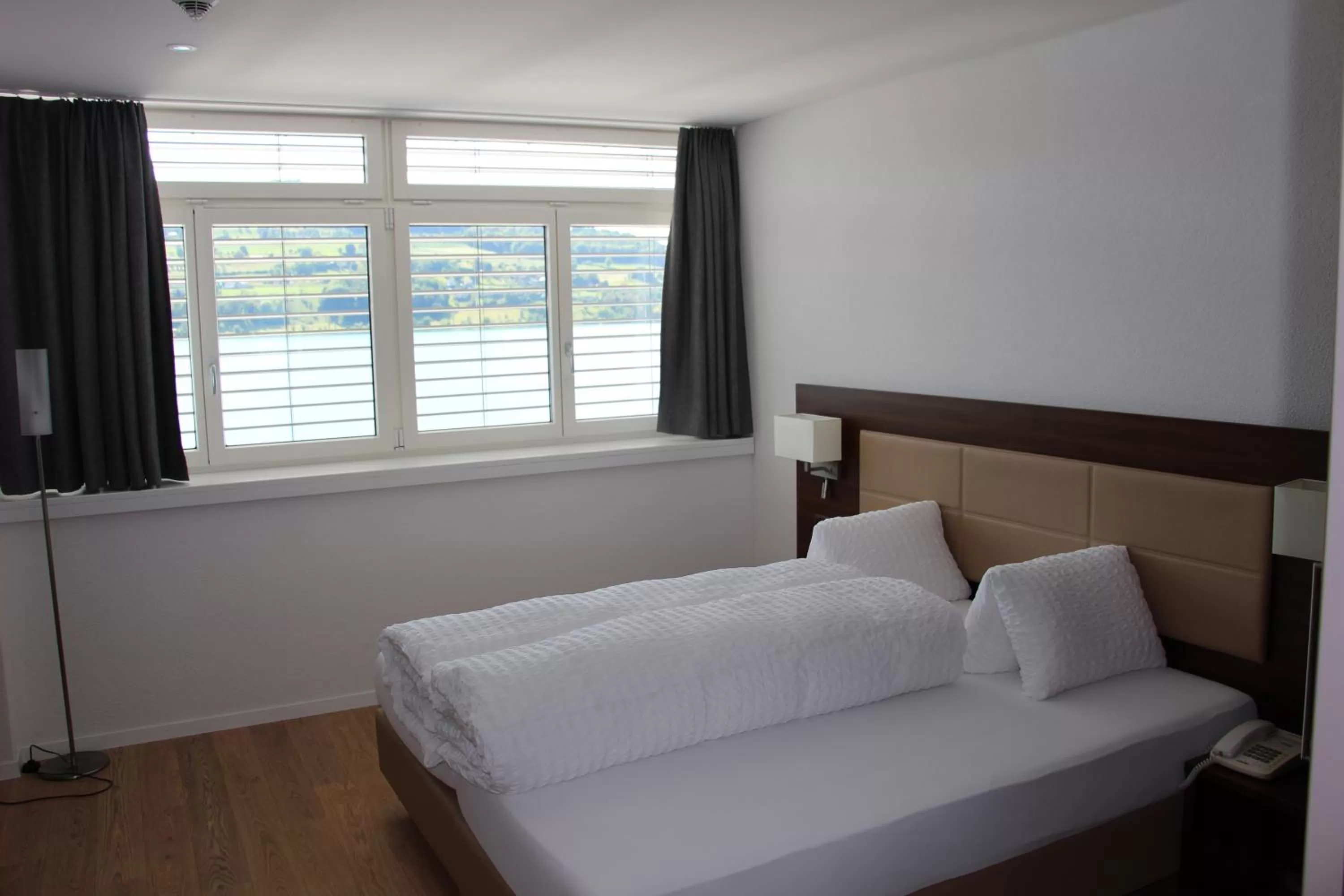 Photo of the whole room, Bed in Seehotel Delphin