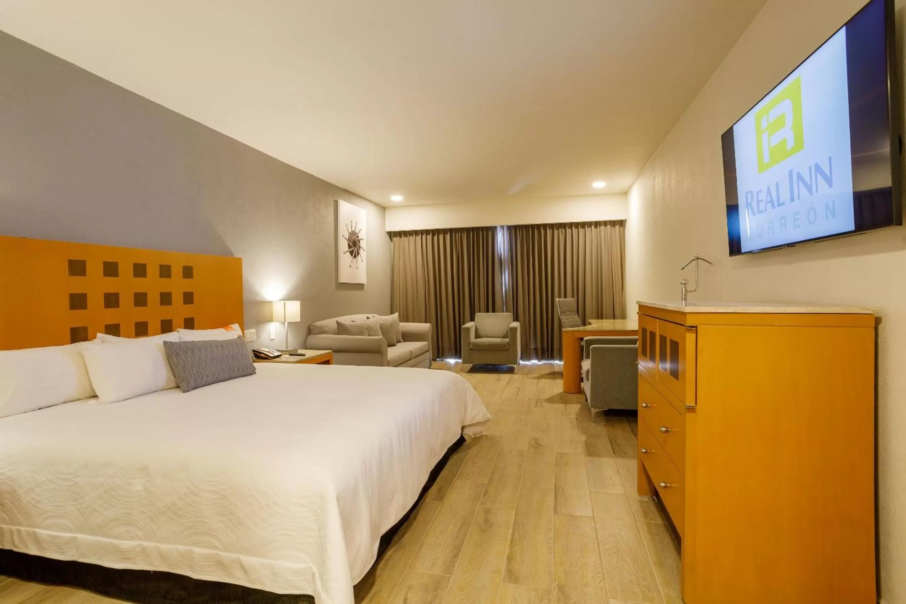 Photo of the whole room, Bed in Real Inn Torreon