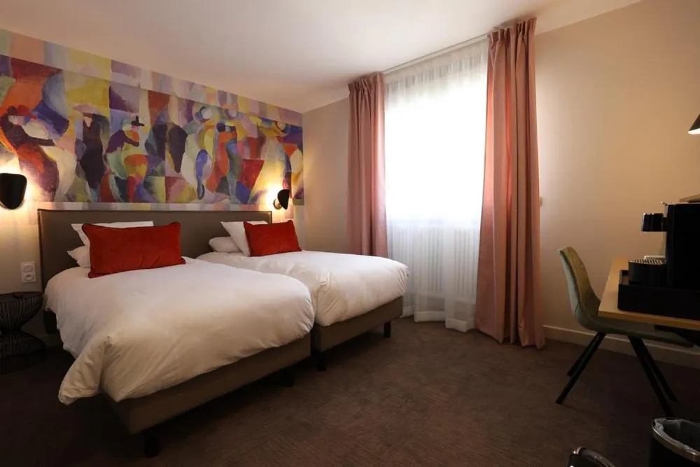 Bed in Hôtel la Capelle Millau