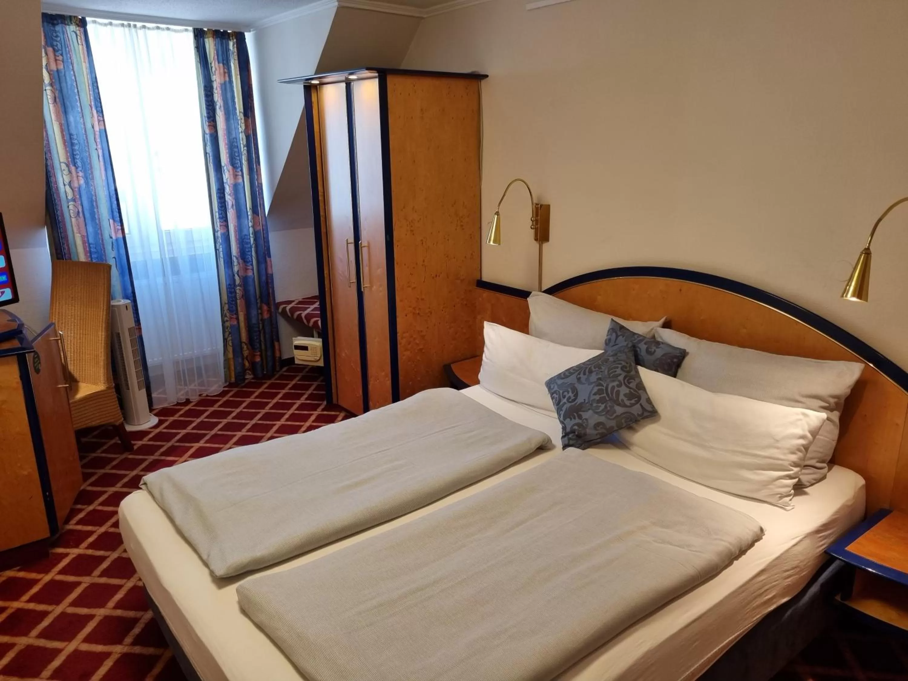 Photo of the whole room, Bed in myMINGA4 - Hotel & serviced Apartments
