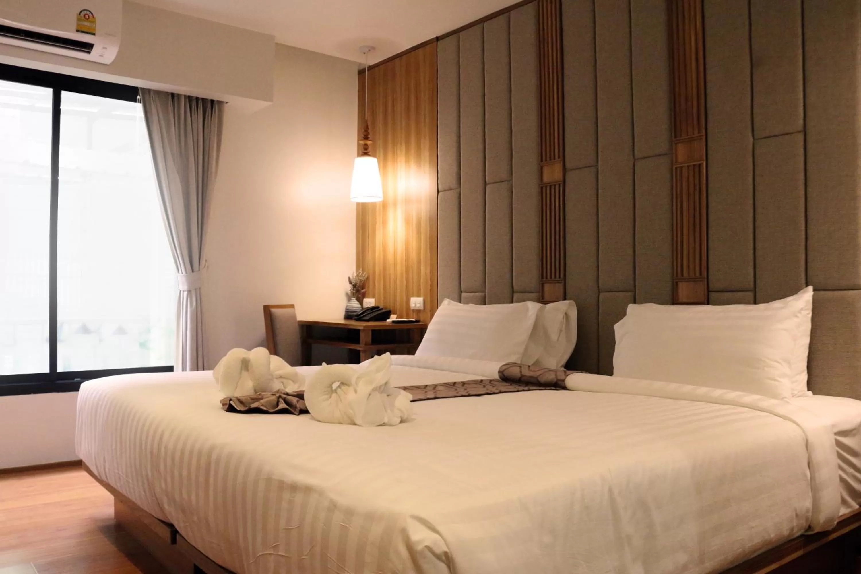 Bed in Lanna Thaphae Hotel