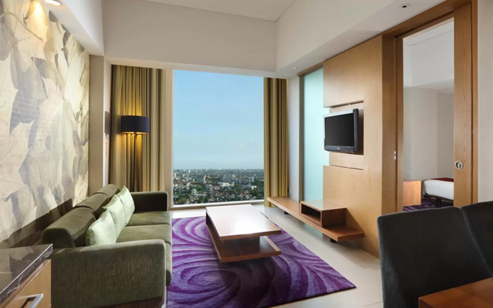 Living room in Holiday Inn Bandung Pasteur by IHG