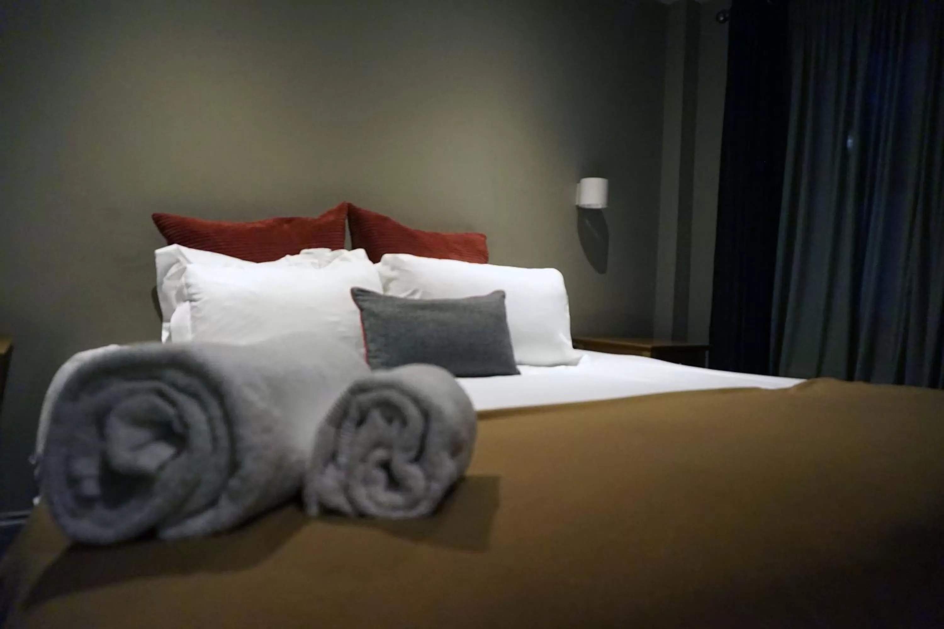 Bed in The Penny Farthing Hotel