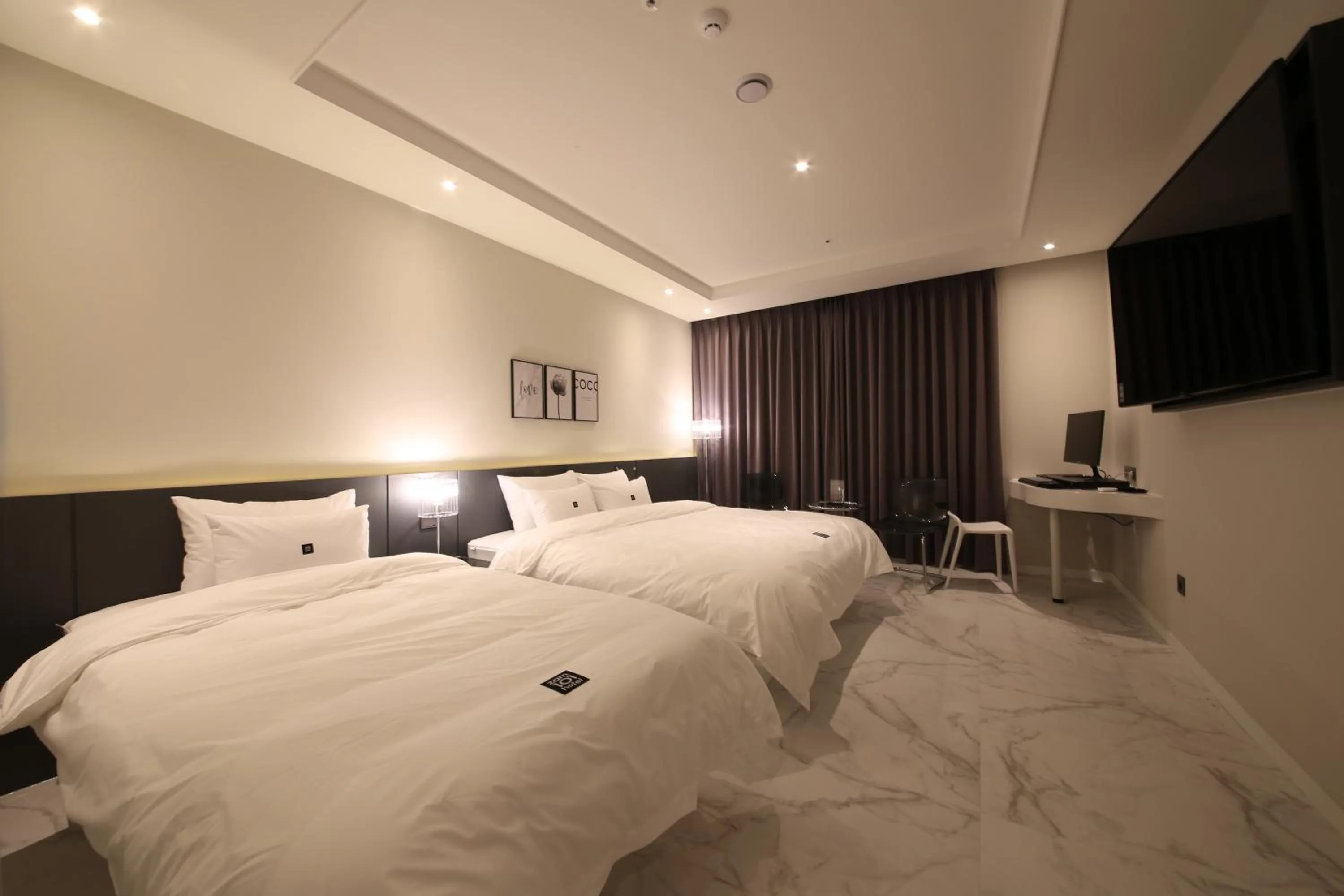 Bed in Zam101 Hotel Gimhae