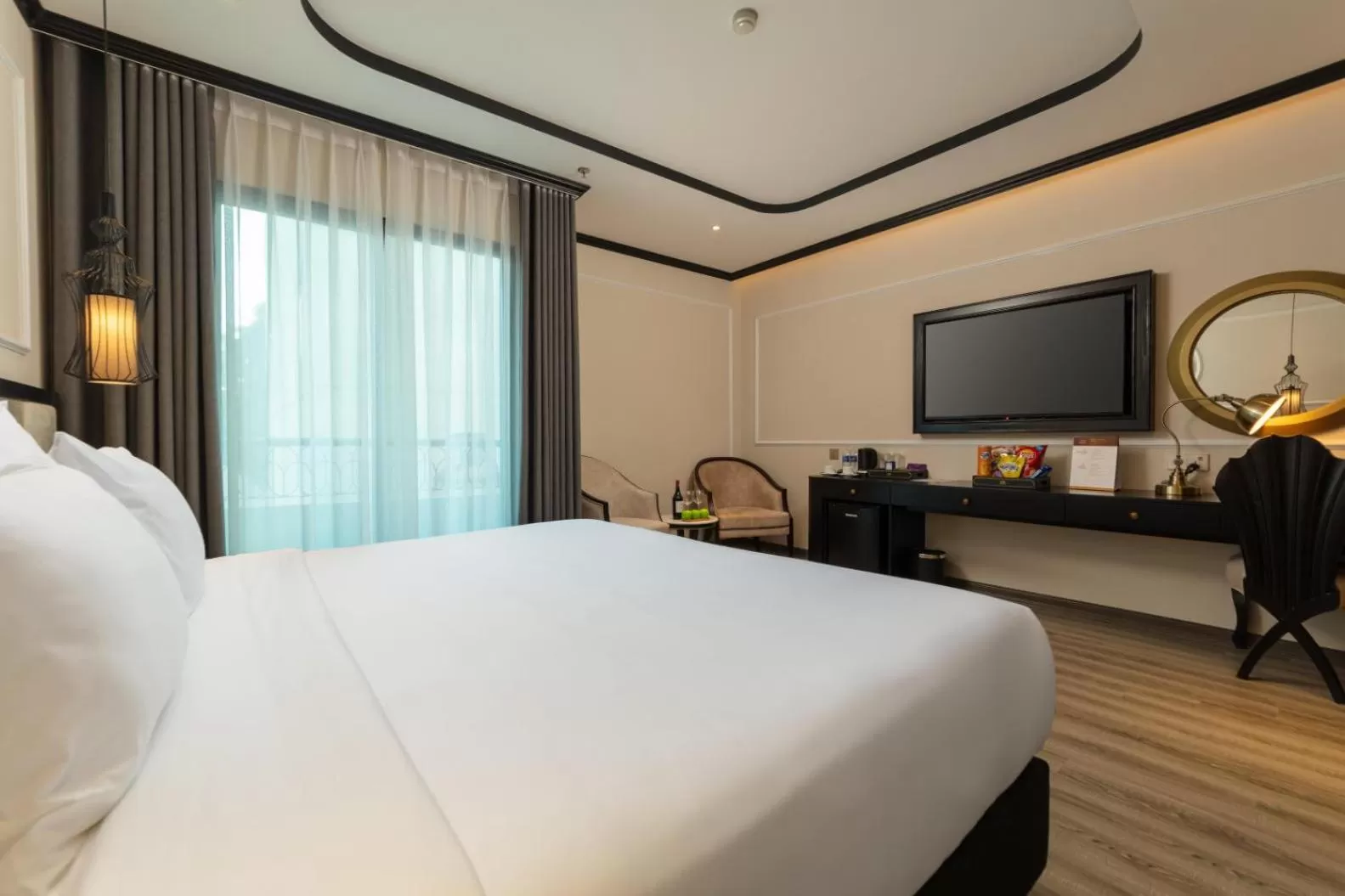 Communal lounge/ TV room, Bed in FTE Ba Dinh Hotel