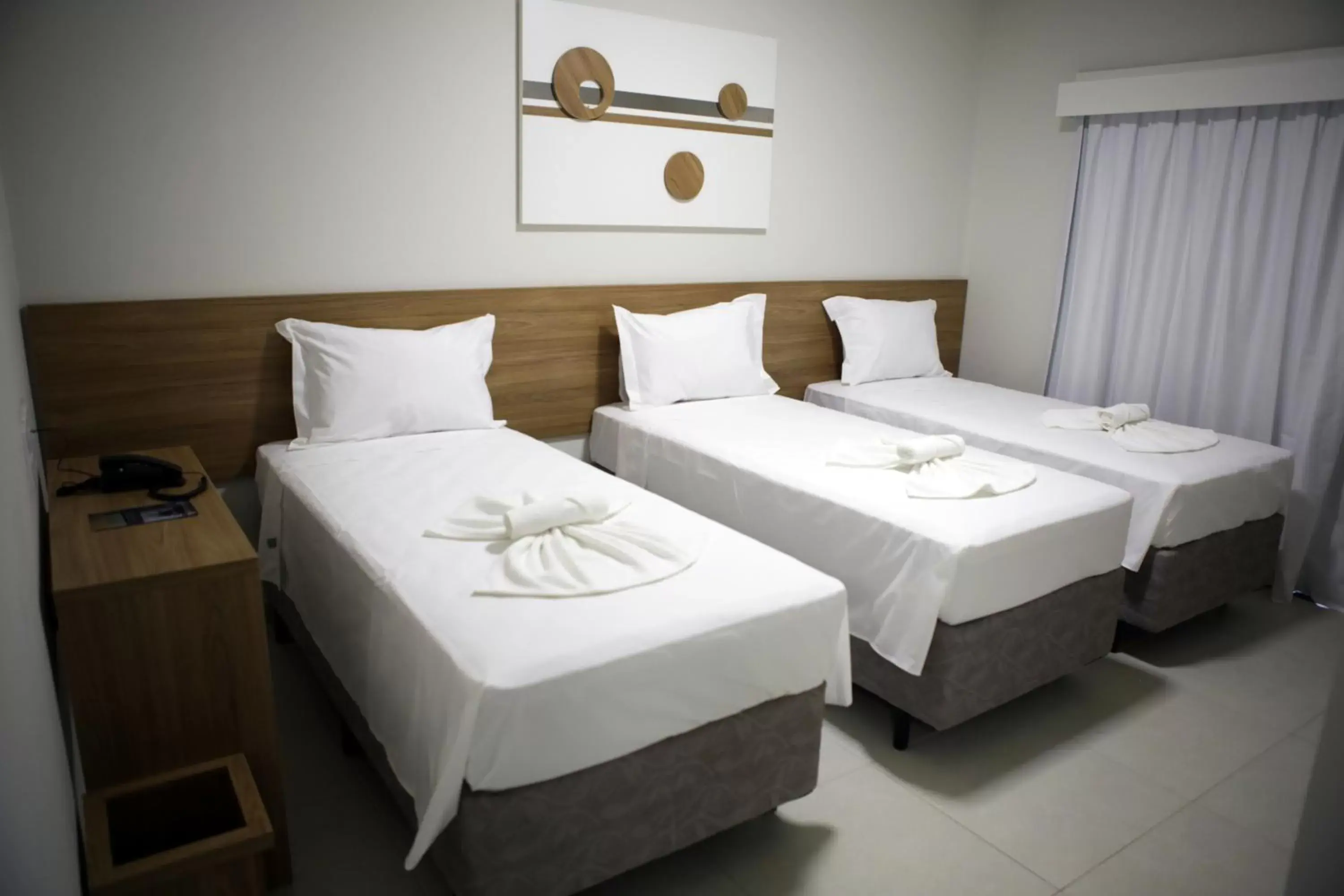 Standard Triple Room in Regional Plaza Hotel Event Park Standard Triple Room in Regional Plaza Hotel Event Park