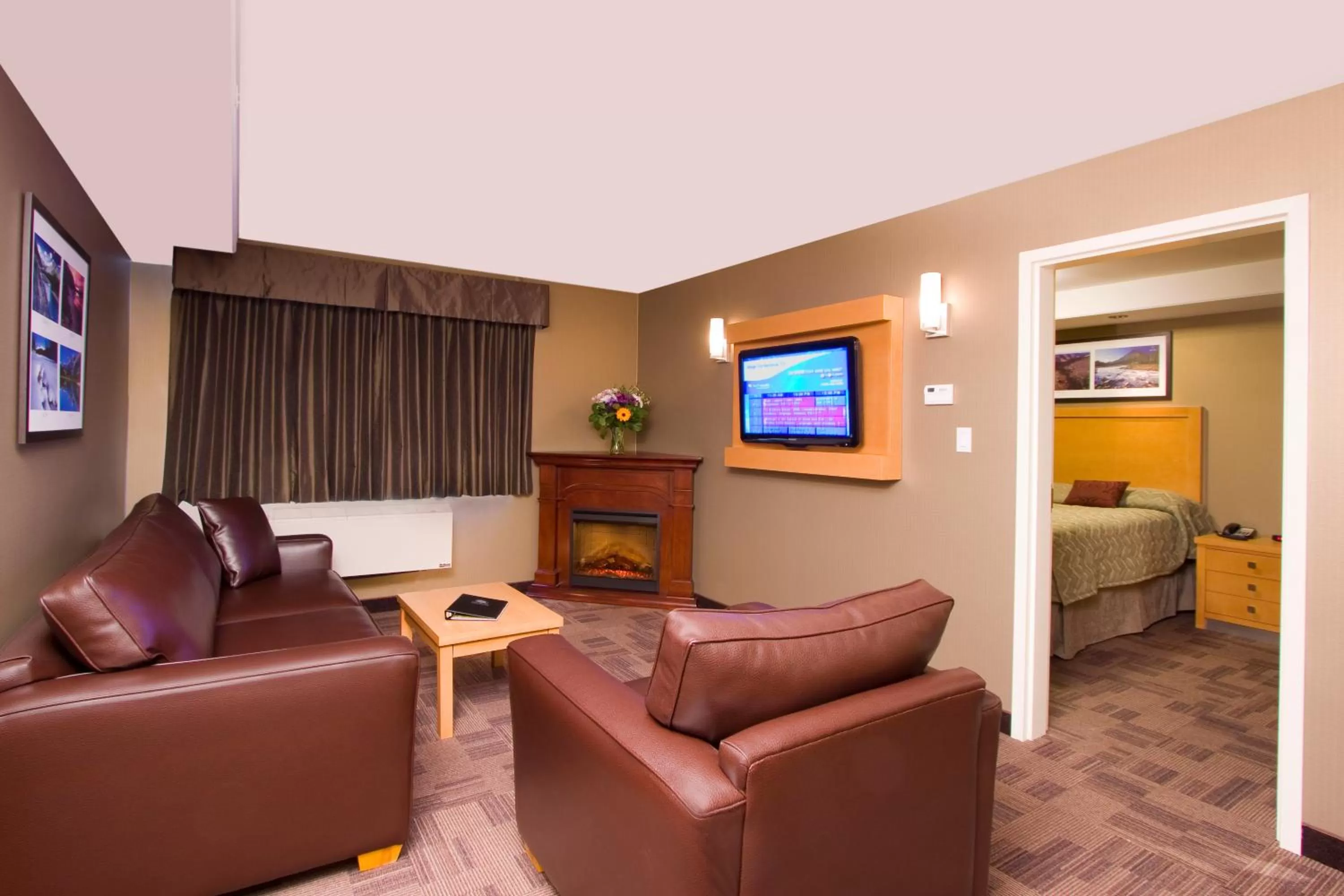 Living room in Woodlands Inn & Suites