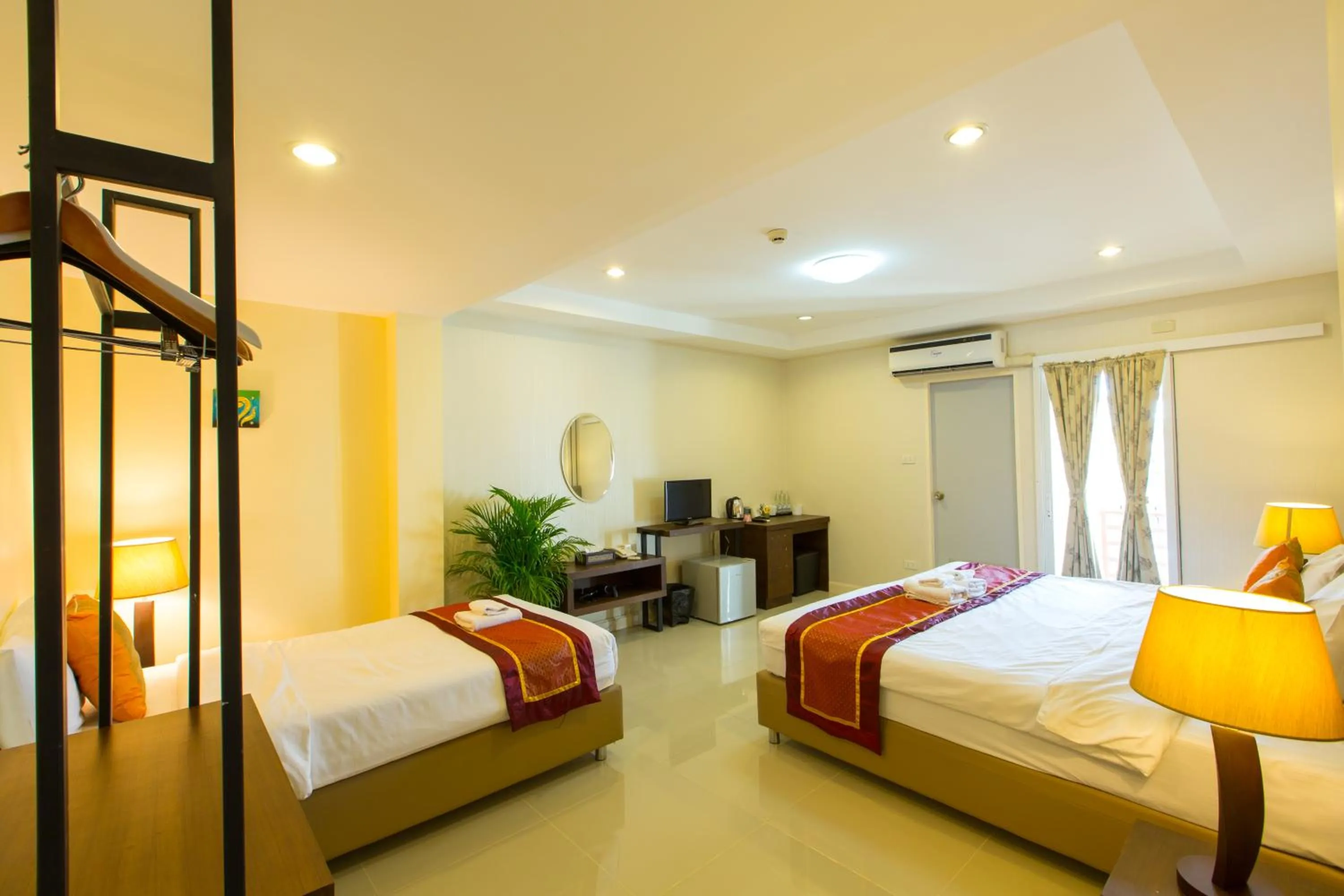 Photo of the whole room, Bed in Chiang Mai Waroros Boutique Hotel