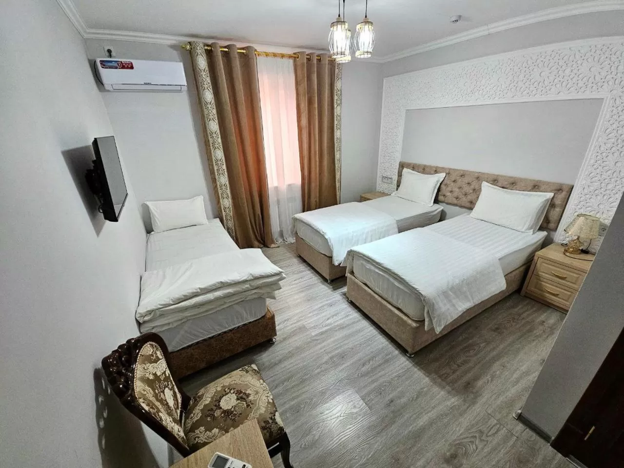 Bed in Khans Palace Hotel