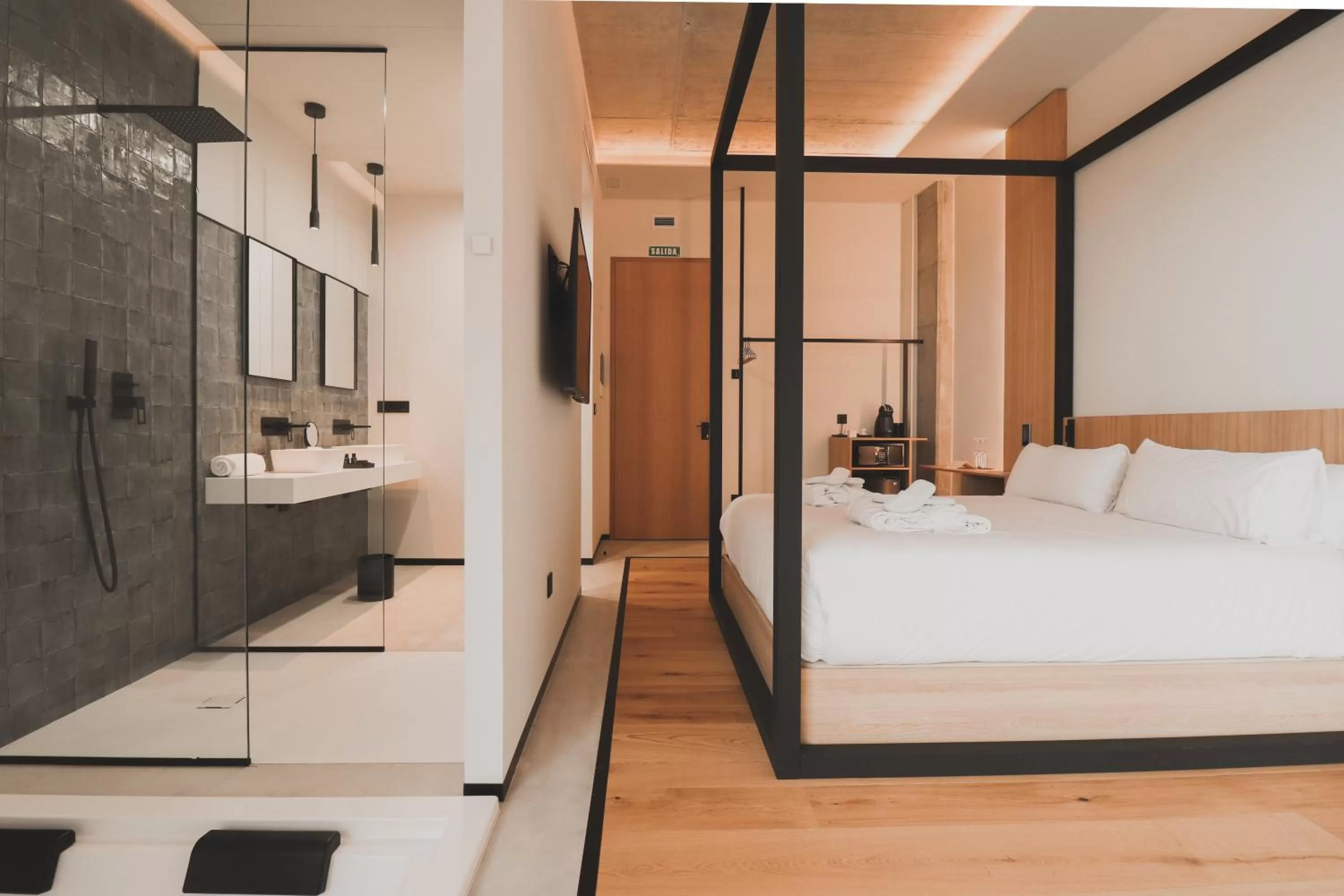 Bedroom in Atmos Hotel Boutique