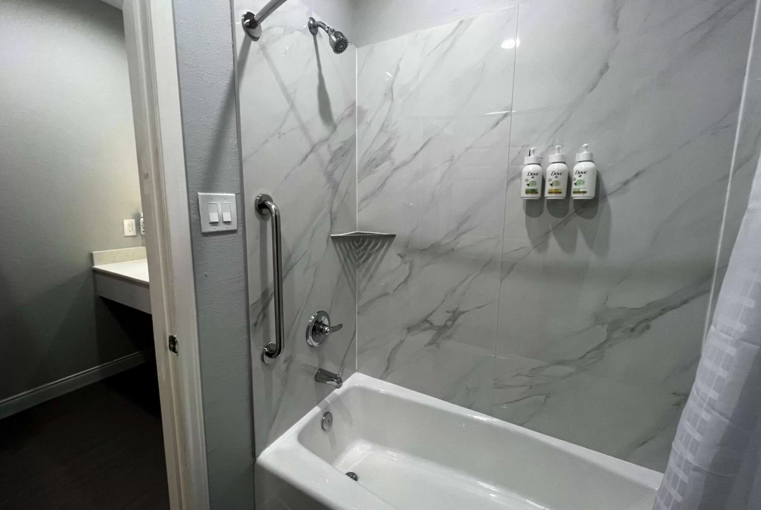 Bathroom in Baymont by Wyndham Freeport Texas