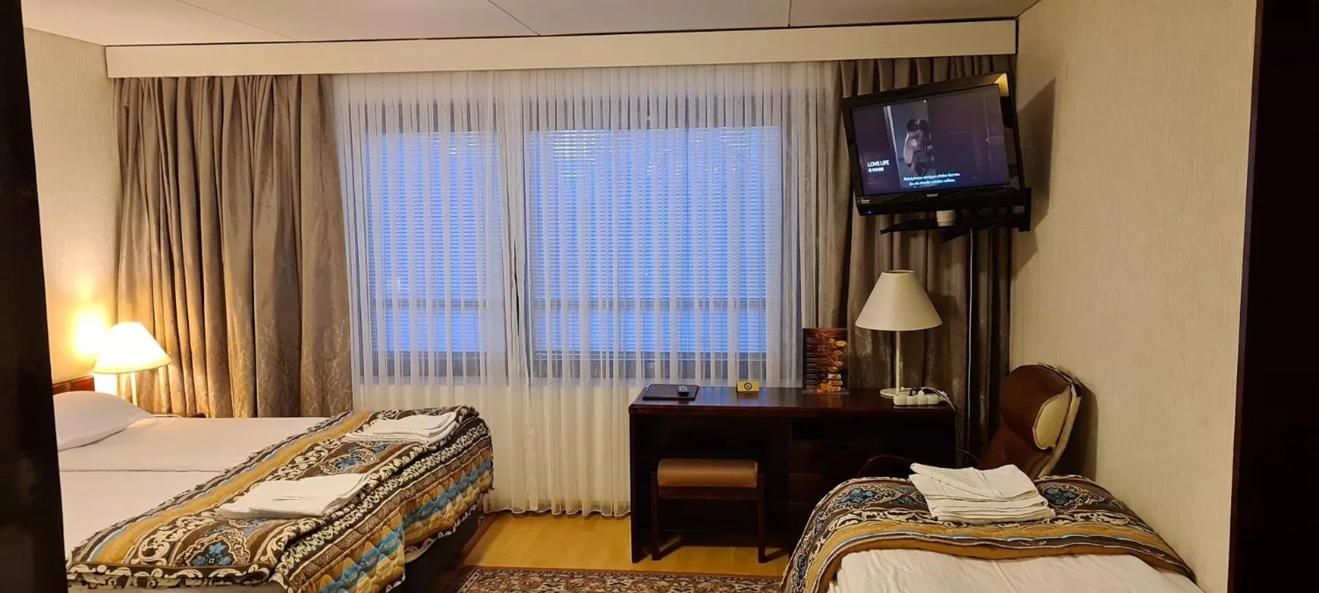 Bed in Hotelli Sandels