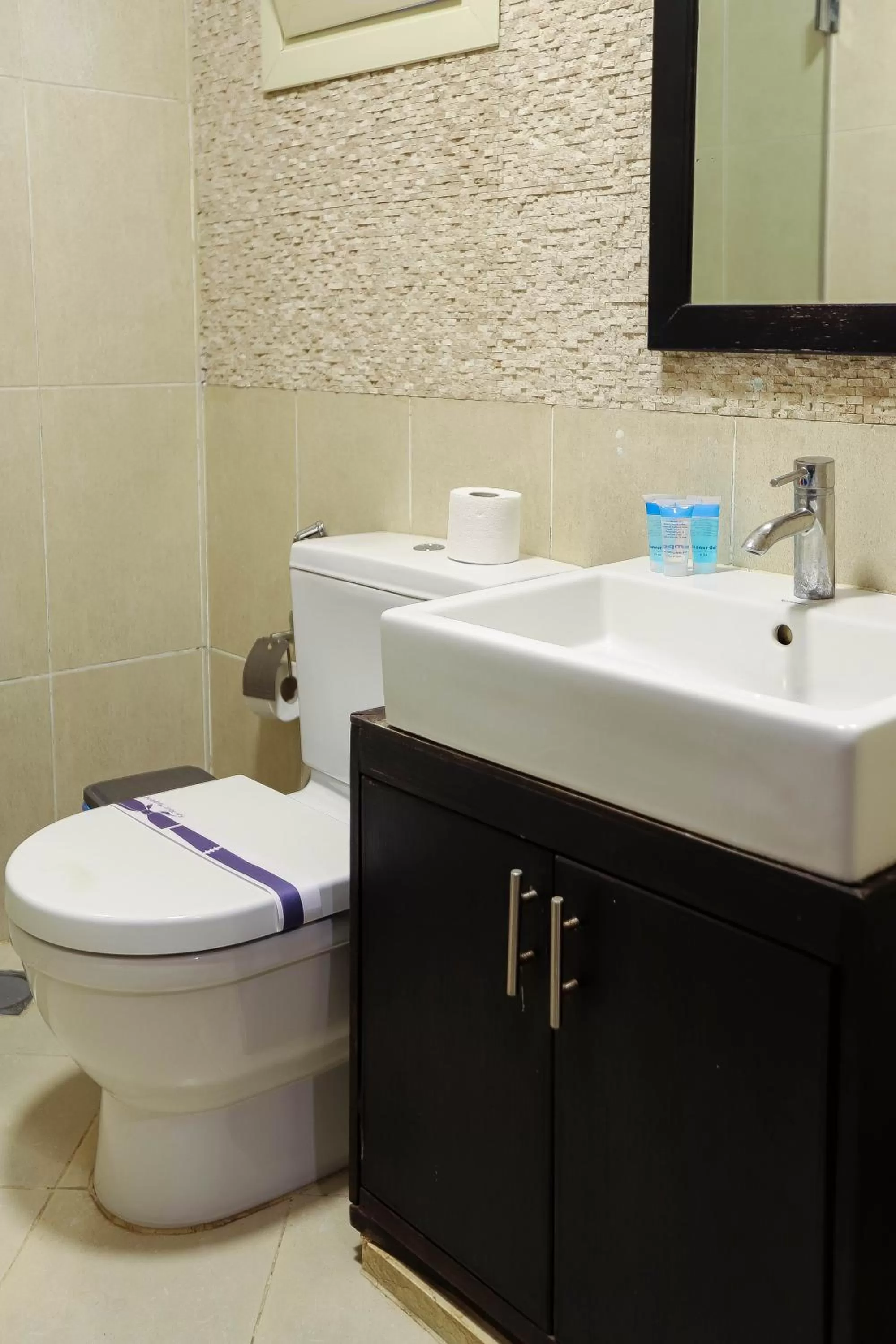 Toilet in NewCity Hotel & Suites