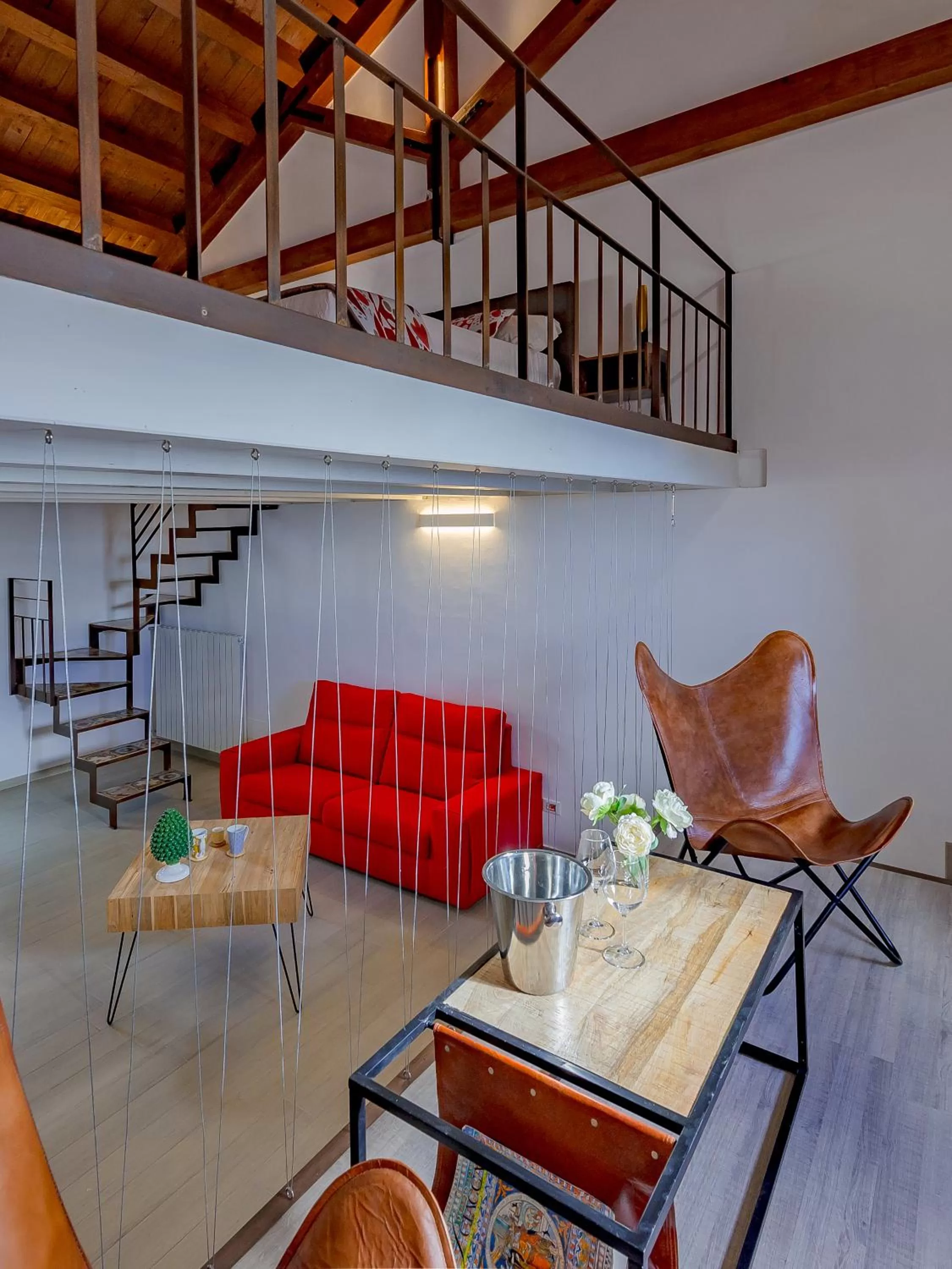 Bed in Le Maestranze Deluxe Rooms