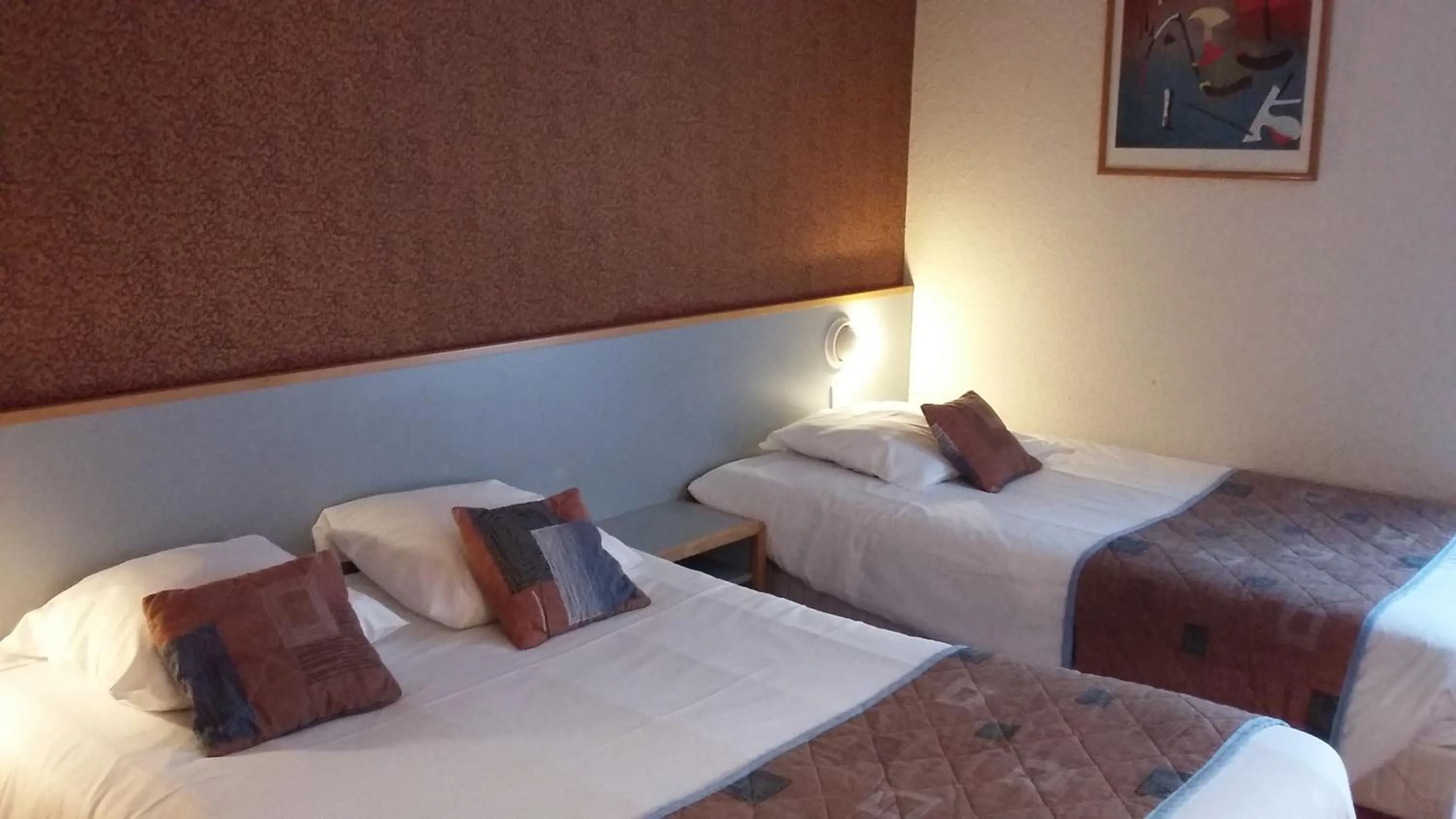 Photo of the whole room, Bed in Hôtel Cositel, CIT'HOTEL Coutances