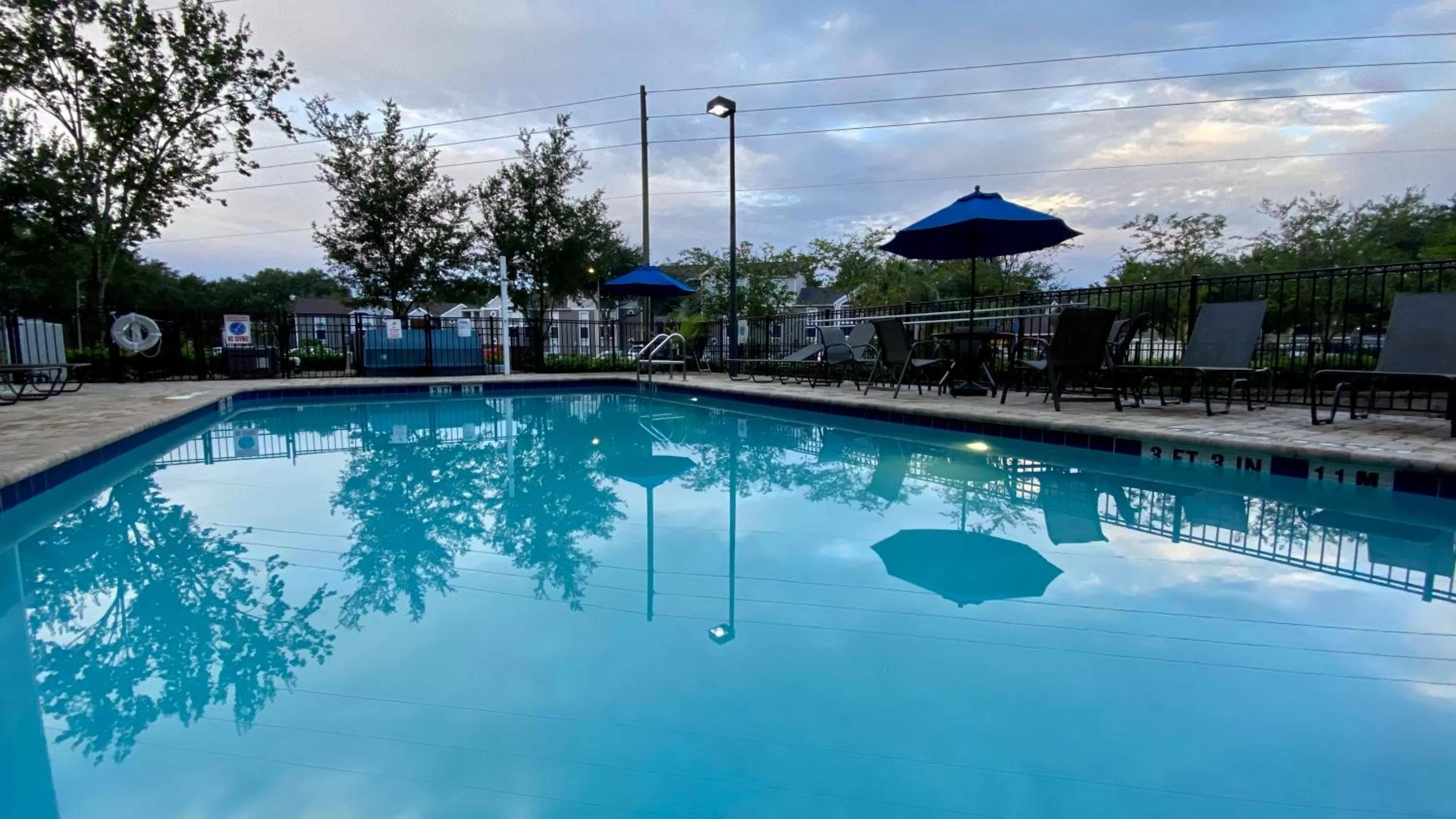 Swimming pool in Holiday Inn Express Hotel & Suites Orlando East-UCF Area by IHG
