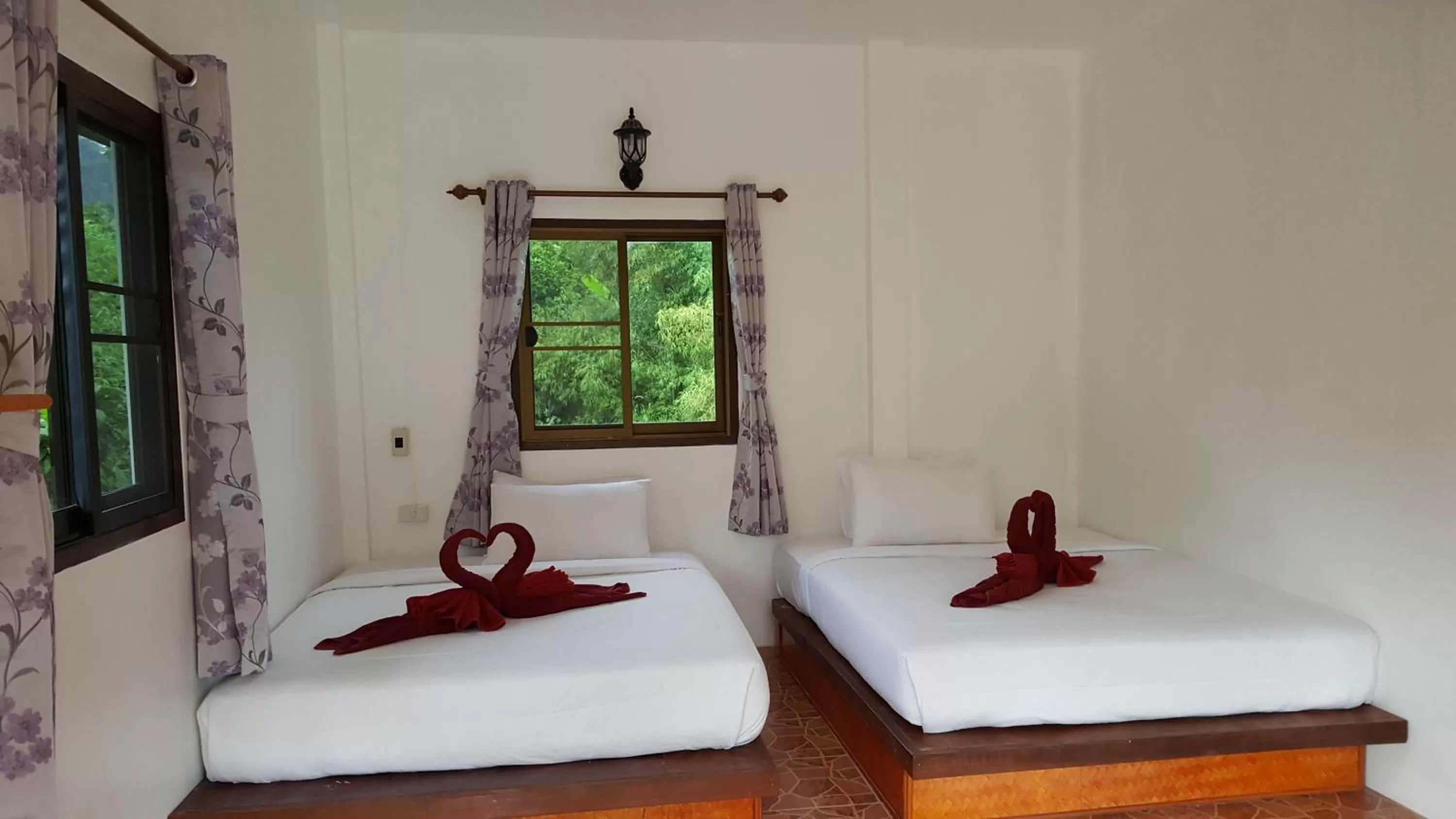 Bed in Khao Sok Jungle Huts Resort