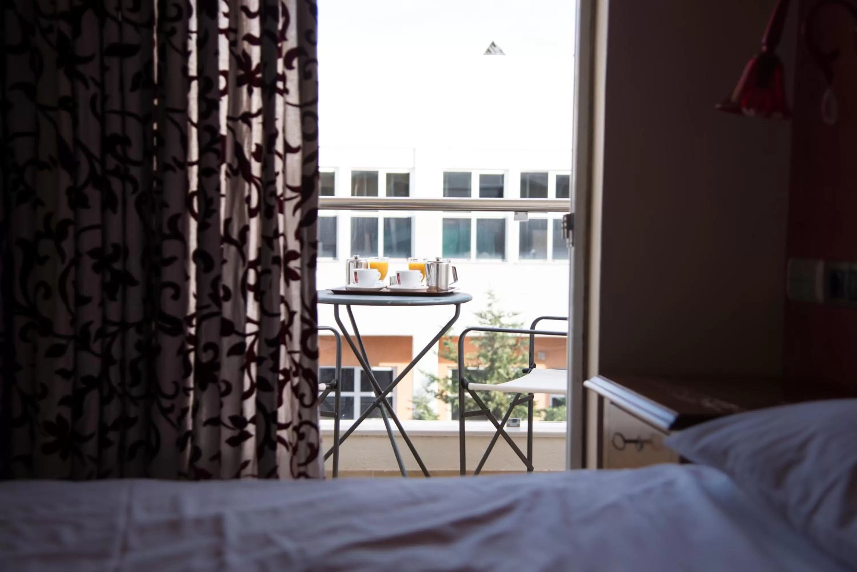 Balcony/Terrace, Bed in Hotel Maroussi