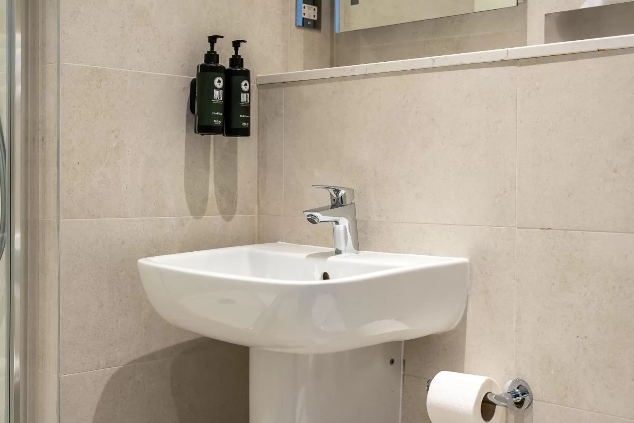 Bathroom in Trafford Hall Hotel Manchester, Trademark Collection by Wyndham