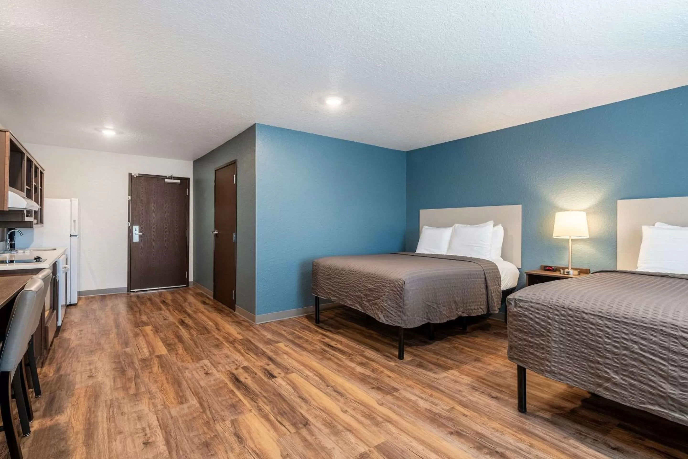 Photo of the whole room, Bed in WoodSpring Suites Sanford North I-4 Orlando Area