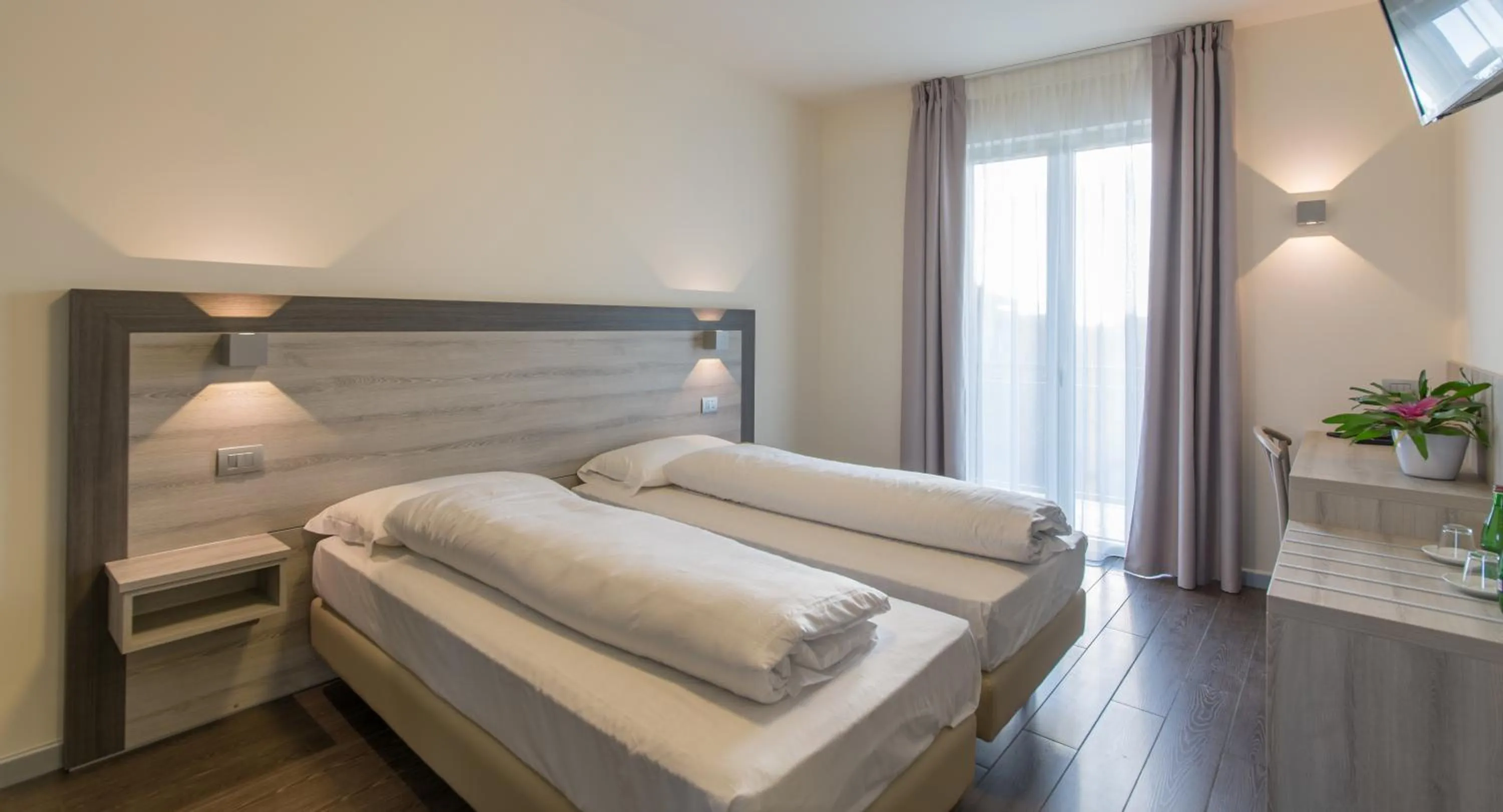 Bed in Hotel Panineria Colombera Rossa