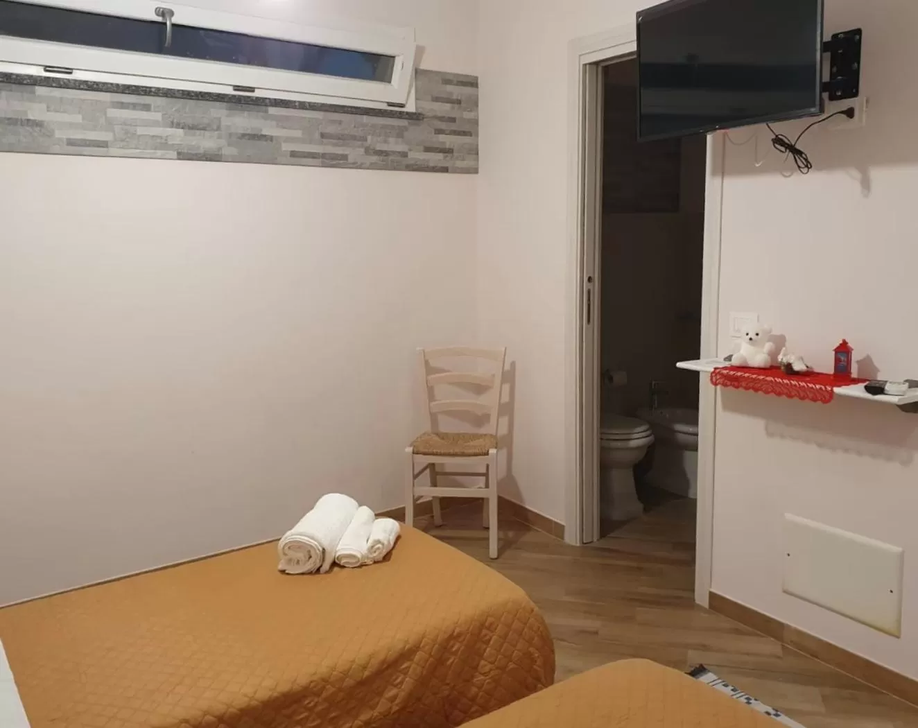 Bed, TV/Entertainment Center in B&B Ranieri