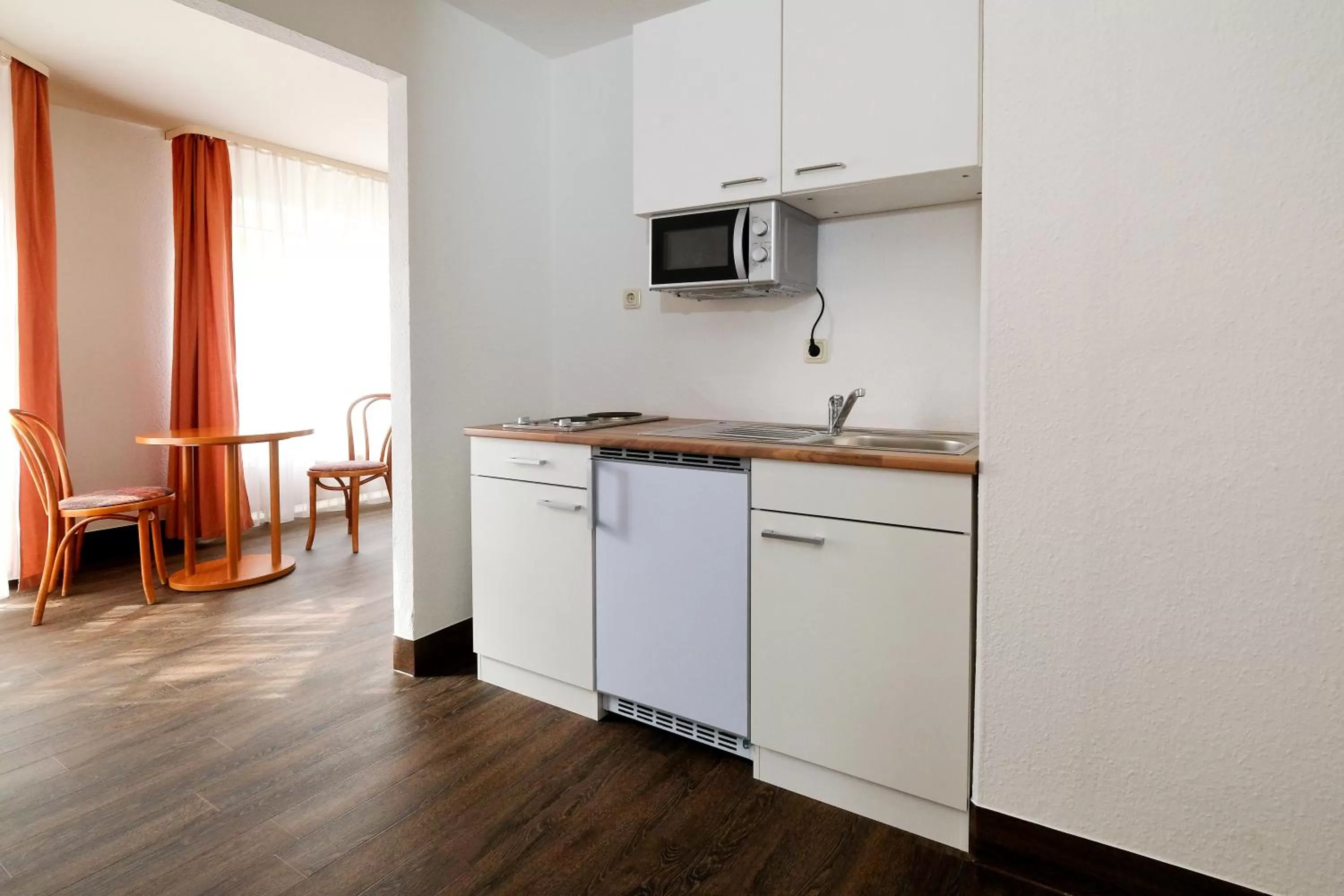 stove in Apart Hotel Sehnde