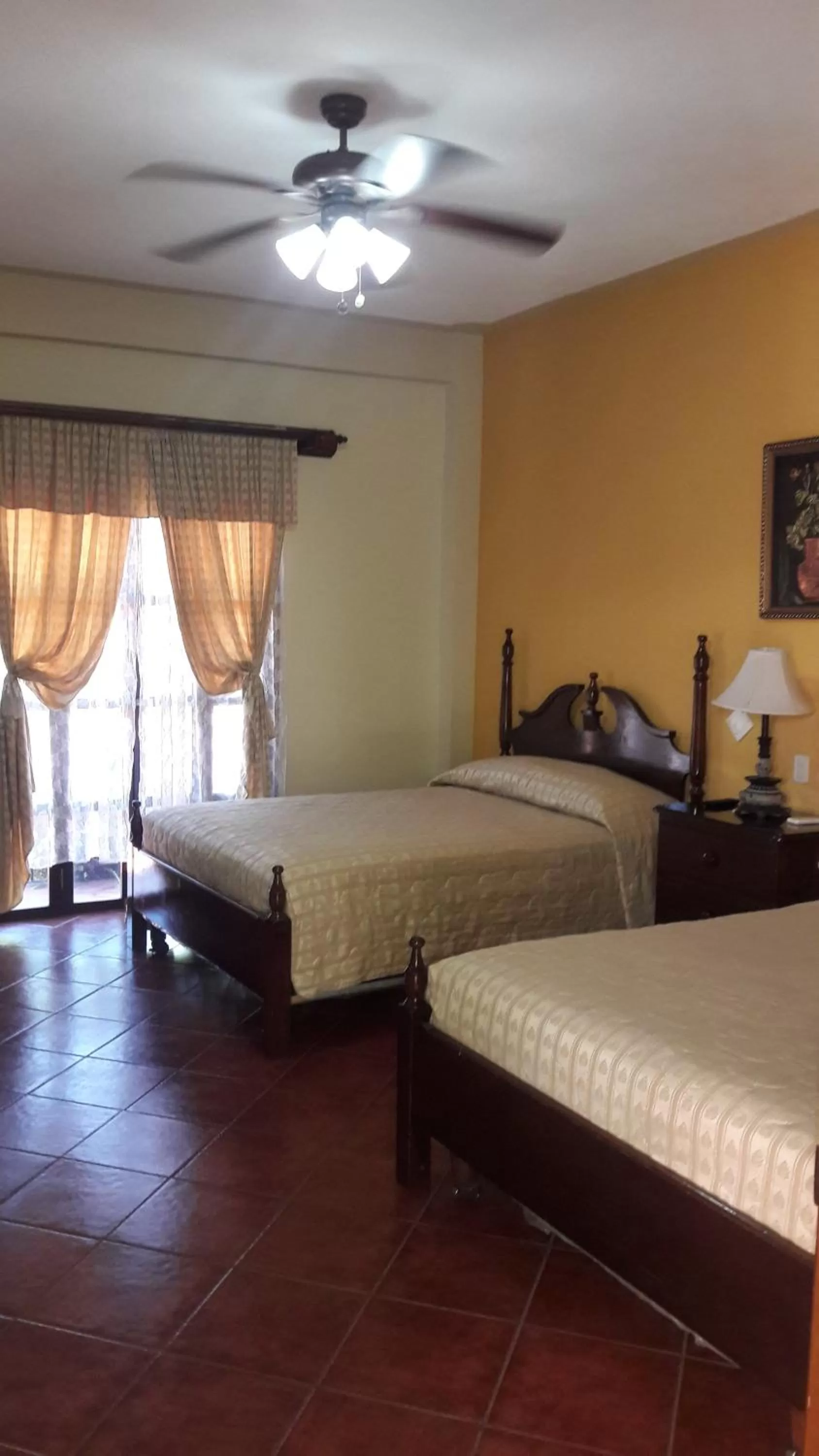 Bed in Hotel Acropolis Maya