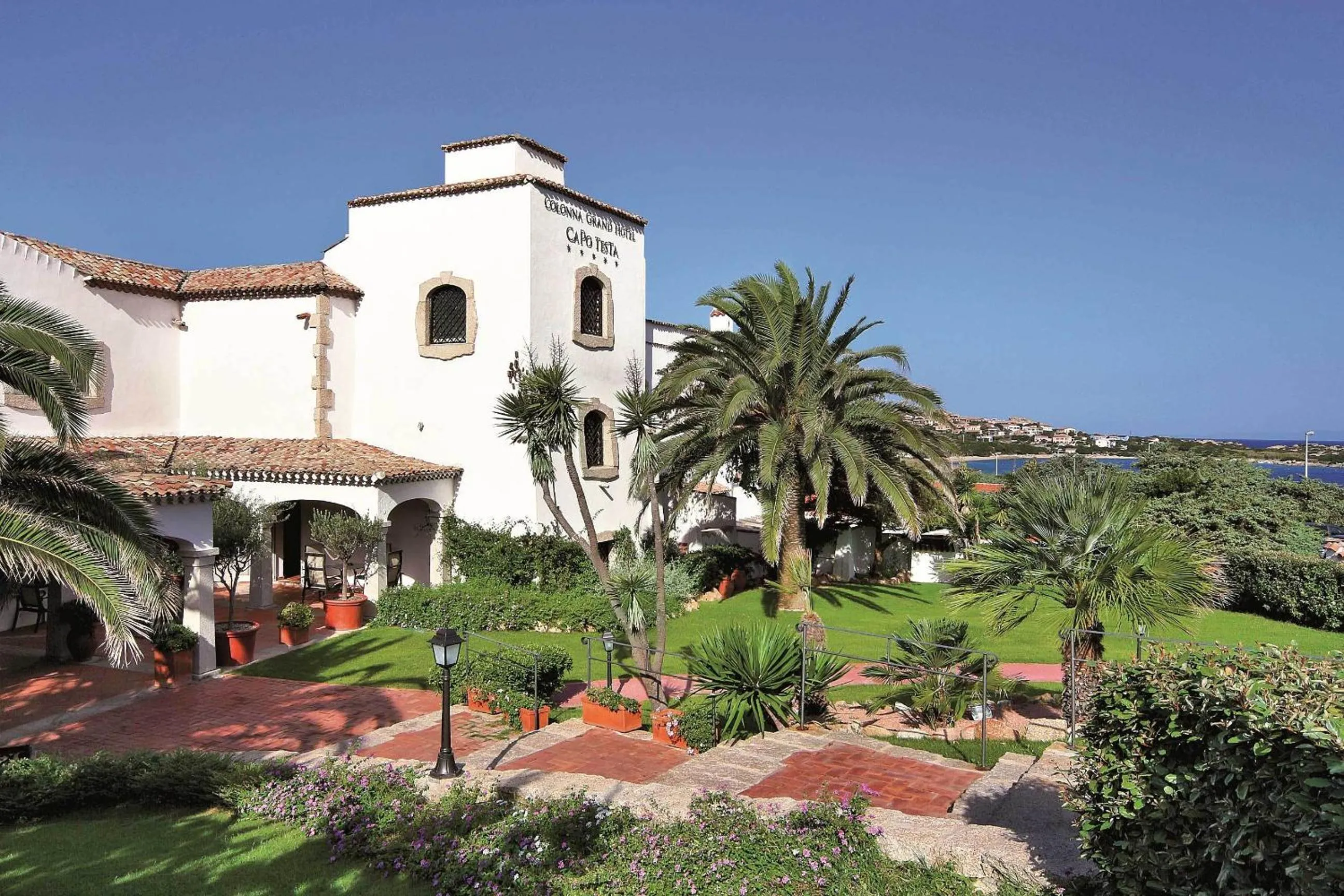 Facade/entrance in COLONNA GRAND HOTEL CAPO TESTA, a Colonna Luxury Beach Hotel, Santa Teresa Sardegna