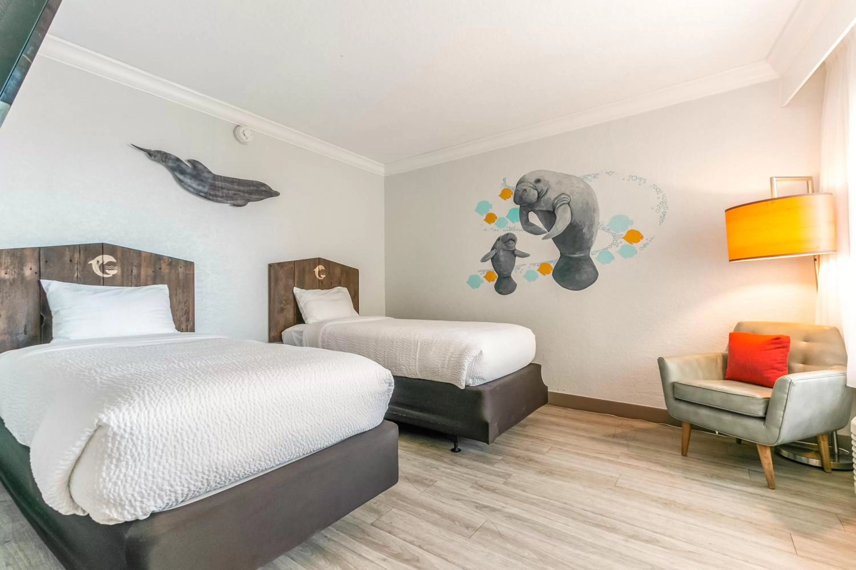 Bed in Dolphin Sands Clearwater Beach, an Ascend Collection Hotel