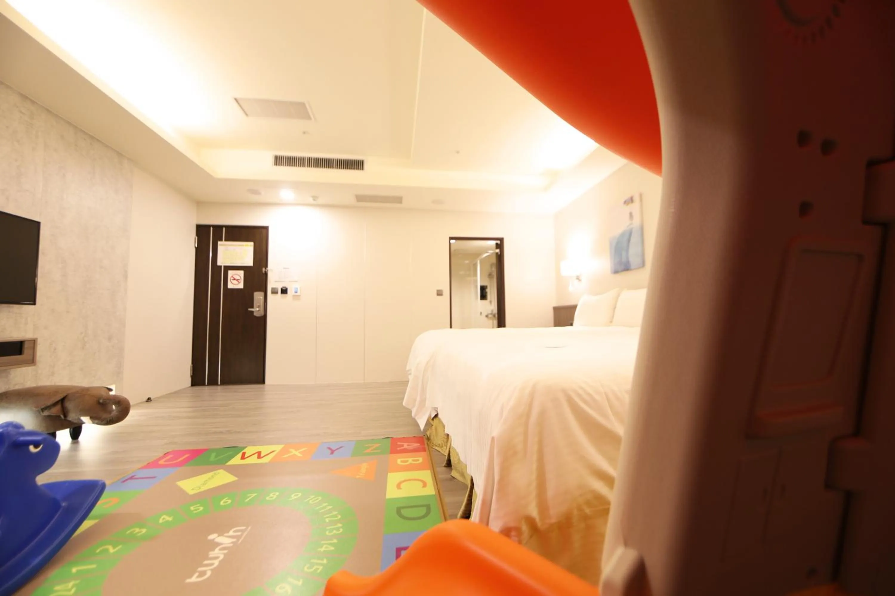 Bed in Grand Earl Hotel