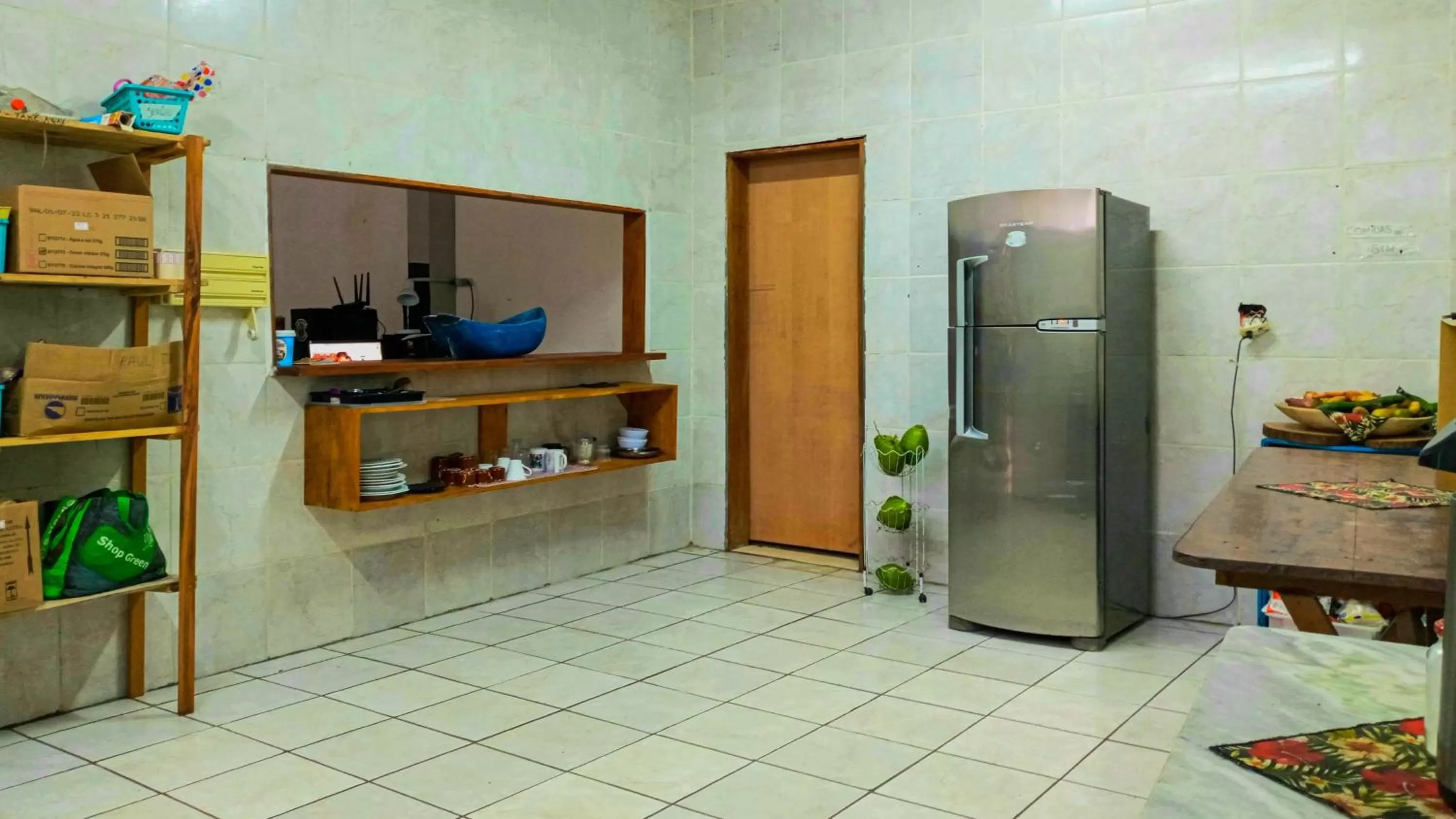 Kitchen or kitchenette in Pousada e Hostel Marthi