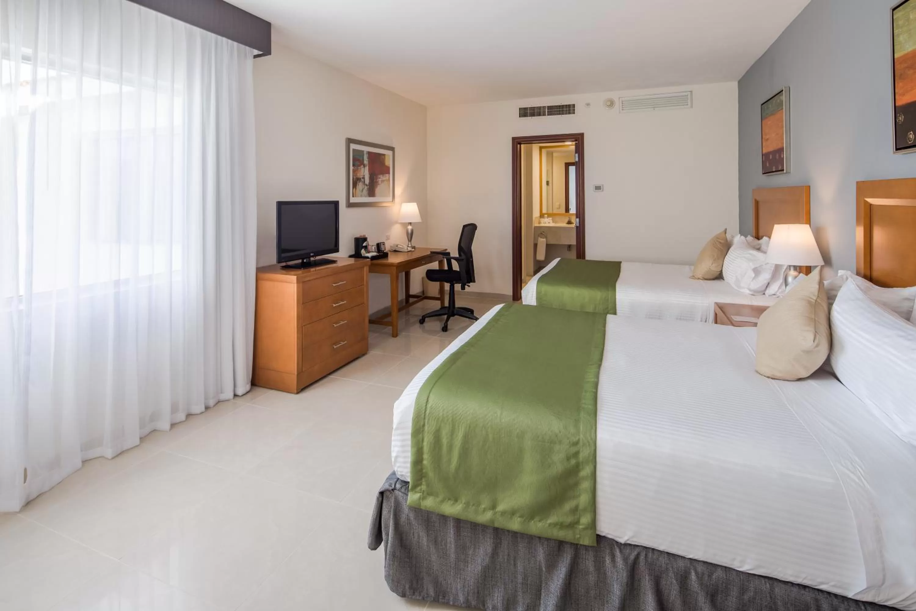 Bed in Wyndham Garden Playa del Carmen