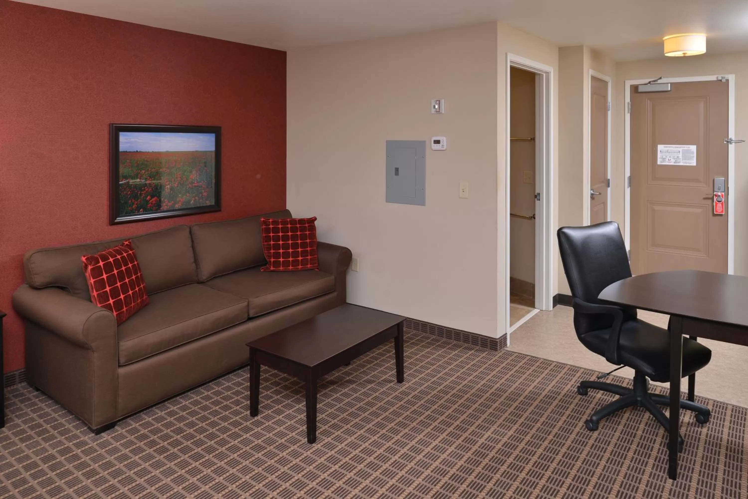 Seating area in Hawthorn Extended Stay by Wyndham Dickinson