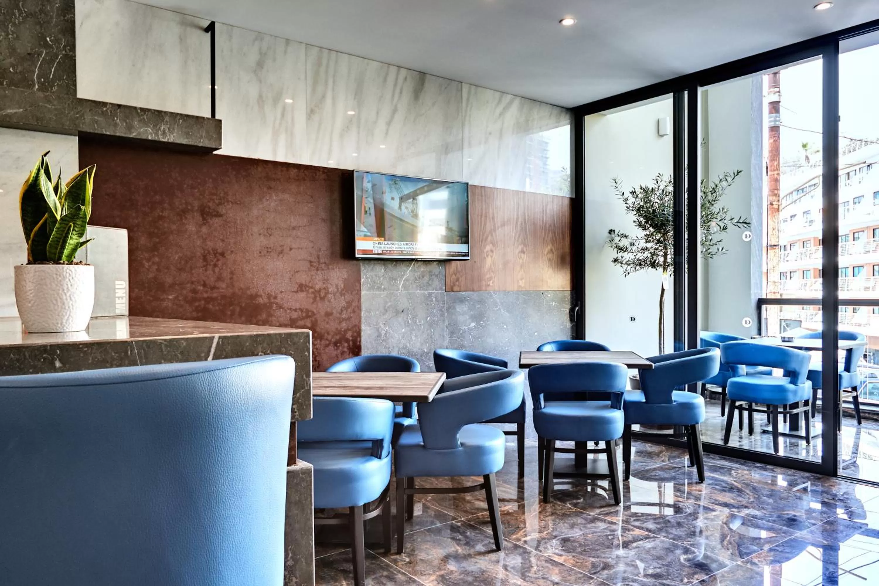 Lounge or bar in The District Hotel