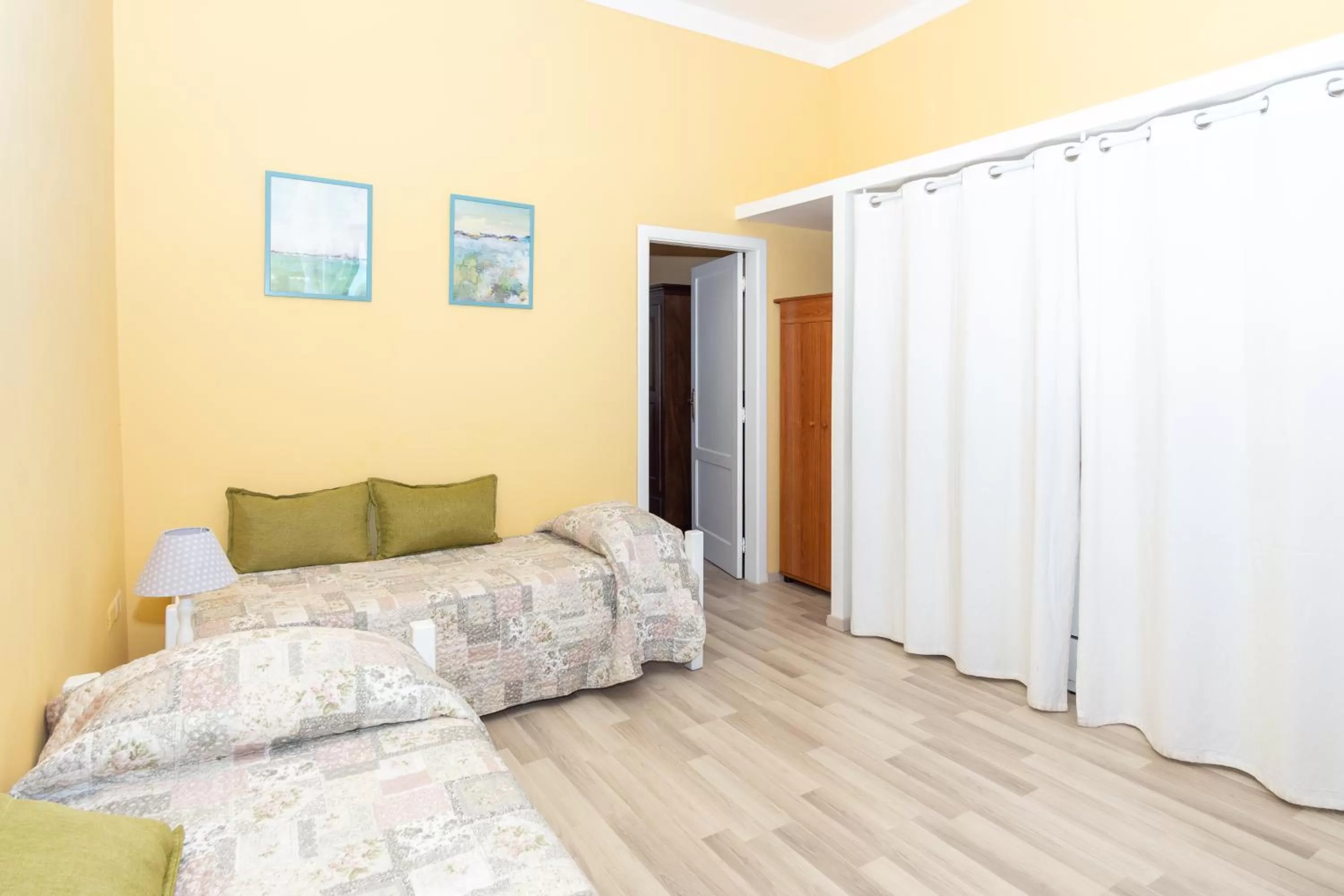 Living room, Bed in La Masseria