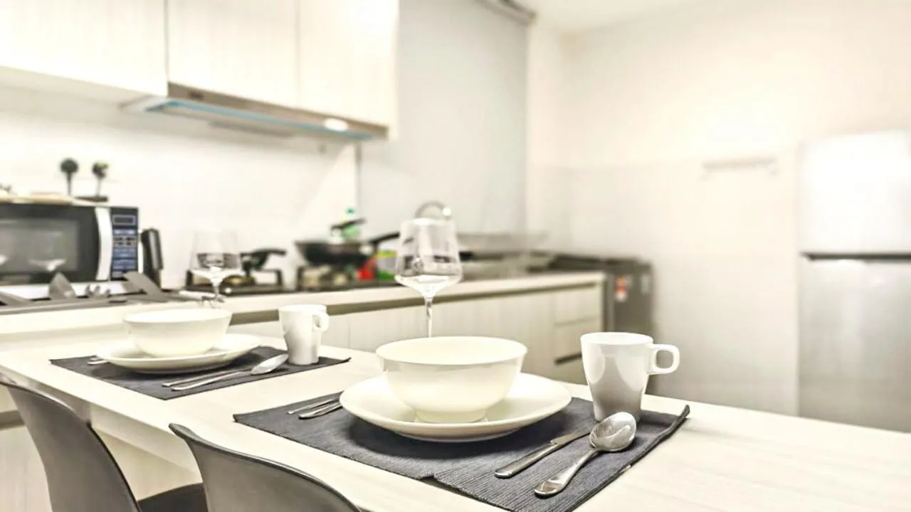 Kitchen/Kitchenette in 1 Tebrau Suites by Subhome