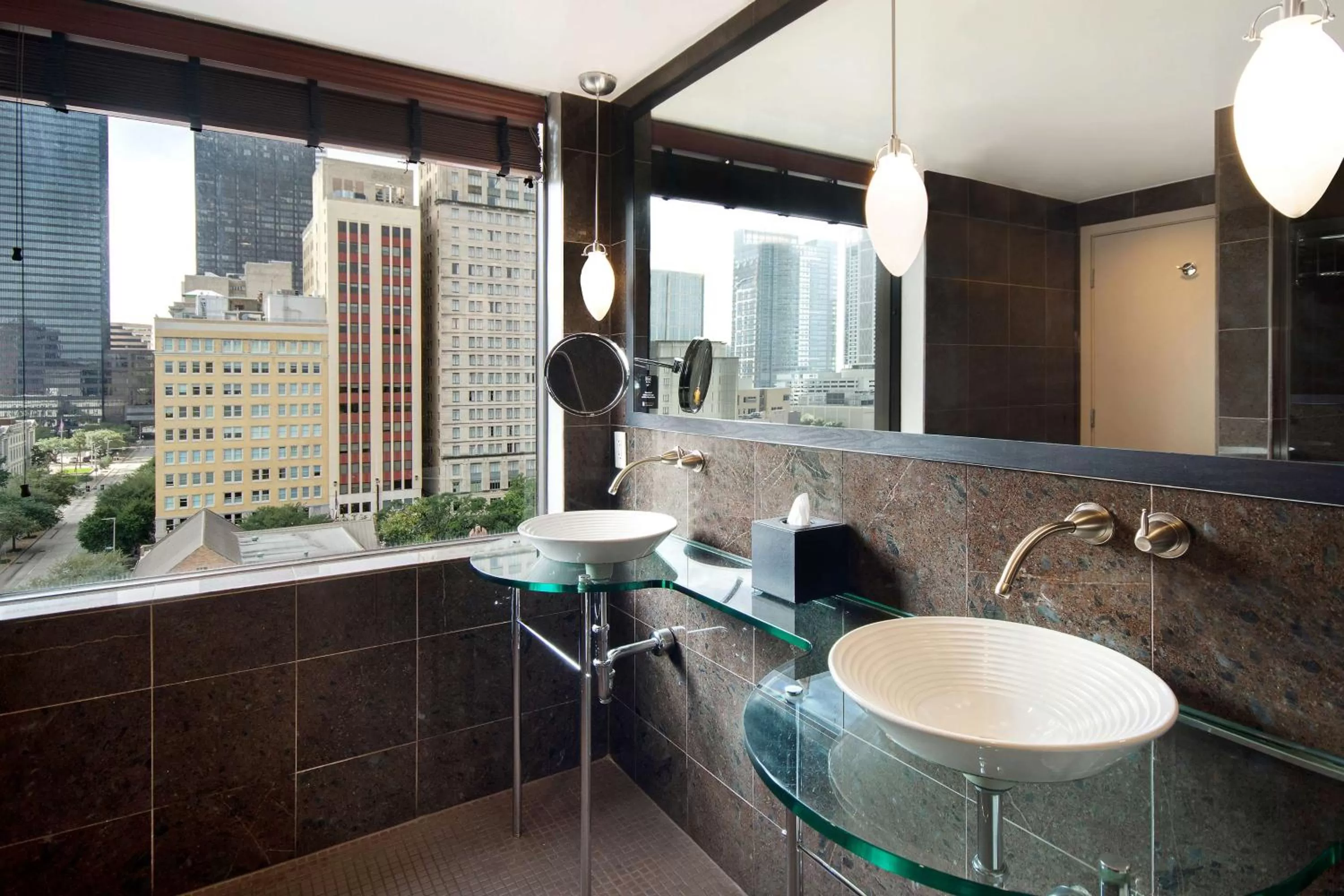 Bathroom in The Sam Houston Hotel, Curio Collection by Hilton