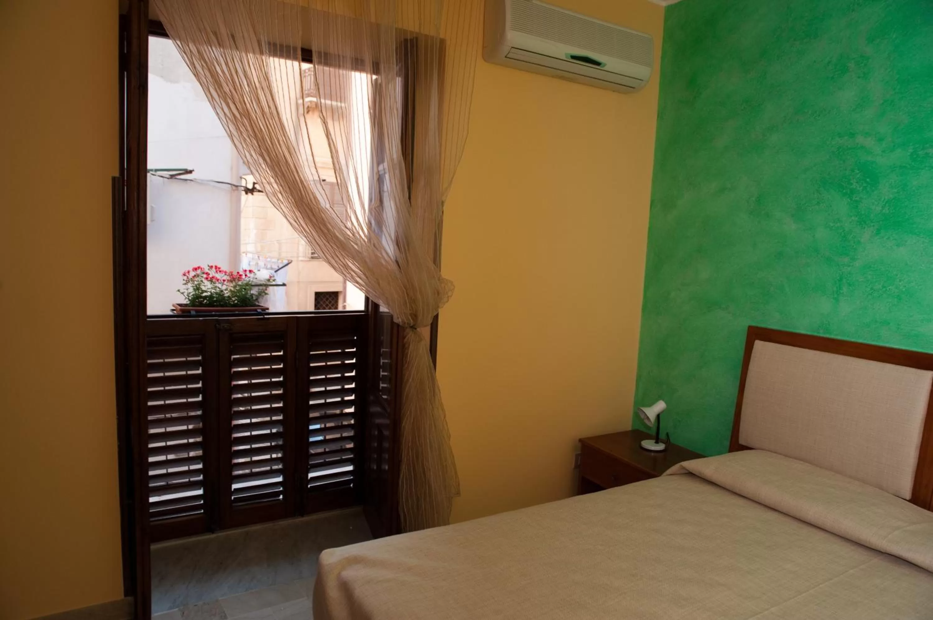 Bedroom, Bed in MiraMare Residence Cefalú